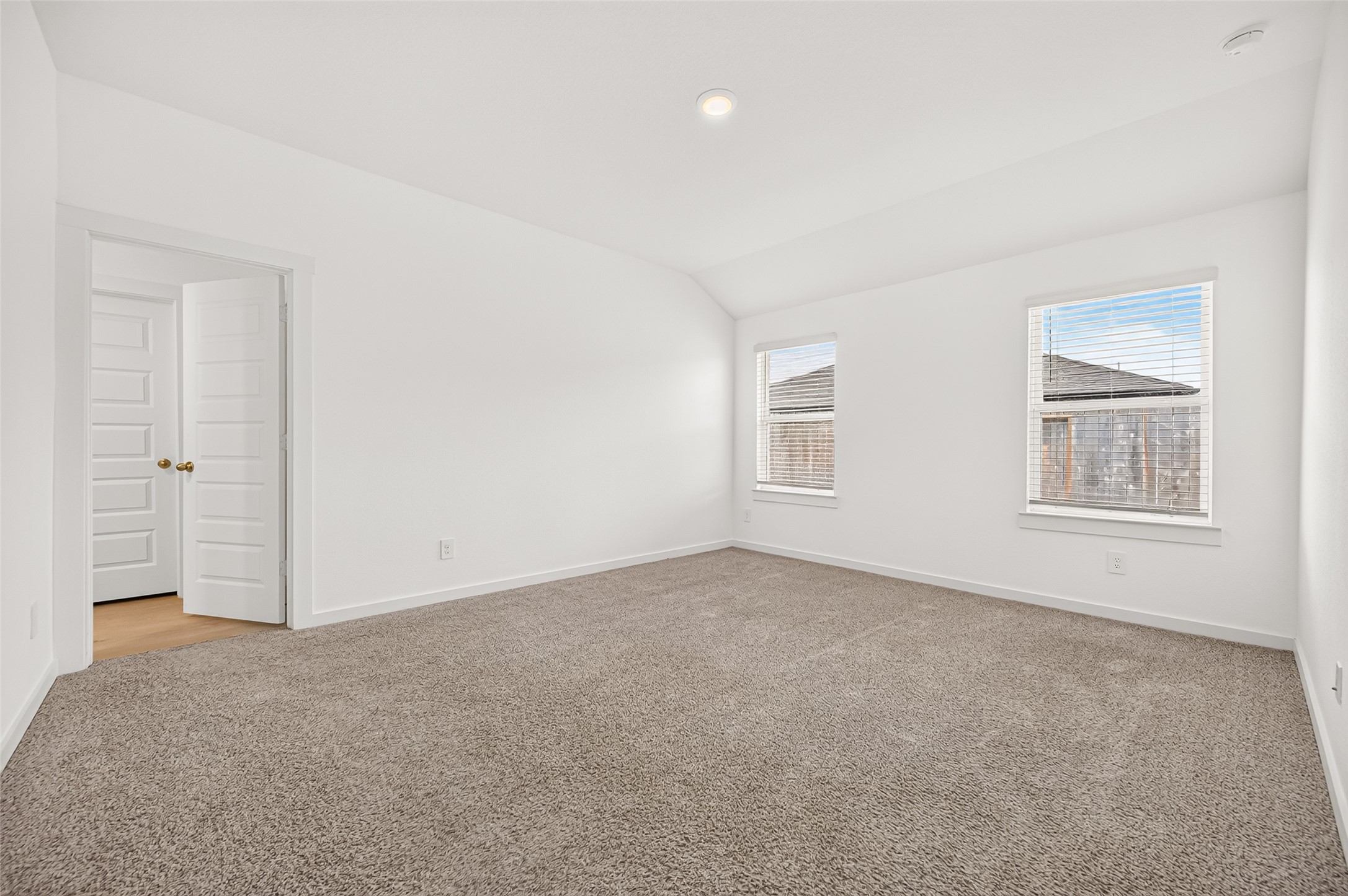 Guest bedroom #2 shares the hallway upfront with guest bedroom #1 and bathroom.