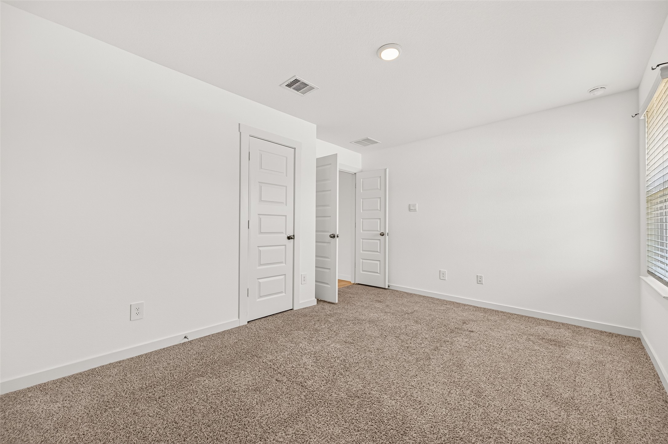 Guest bedroom #4 sits off the side of the kitchen. I would make a great office or media room as well.