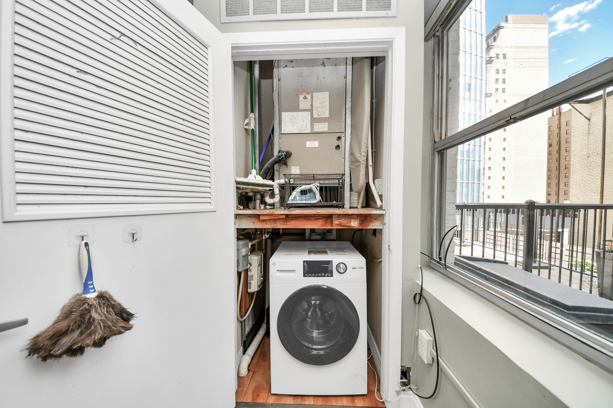 Washer/dryer within the unit.