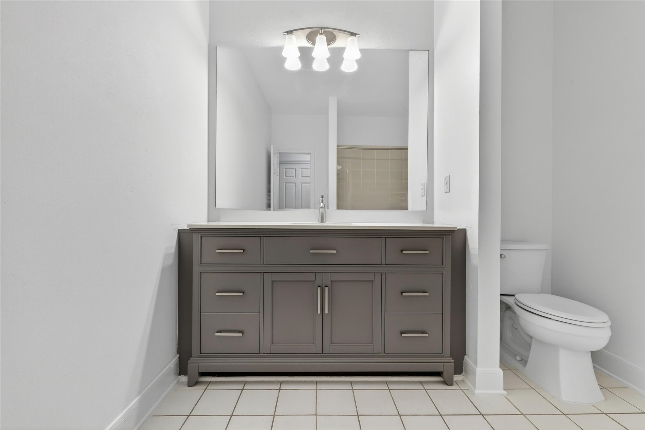Updated bathrooms with modern fixtures and designer touches.
