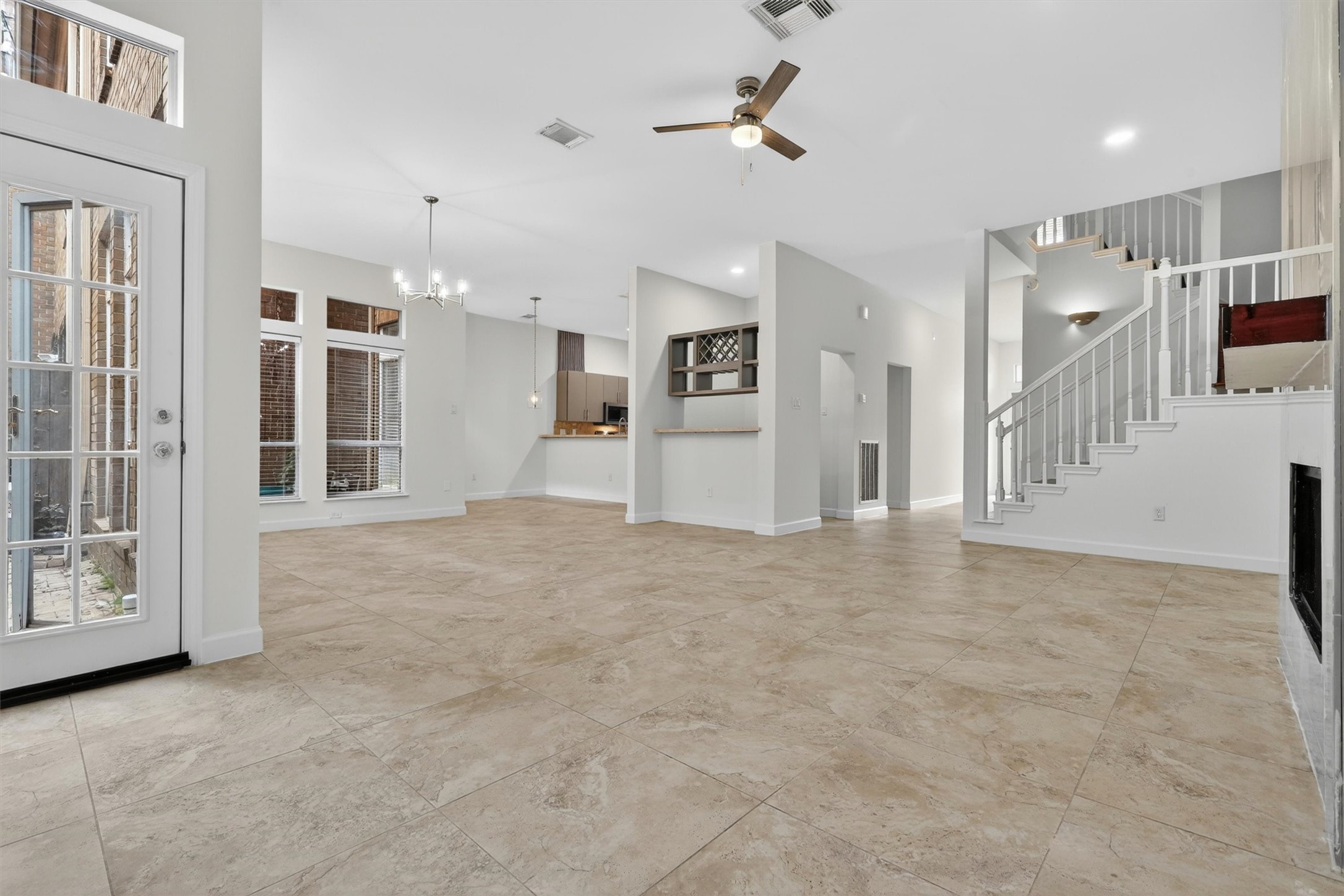 Bright and airy floor plan with seamless flow between living, dining, and kitchen spaces.