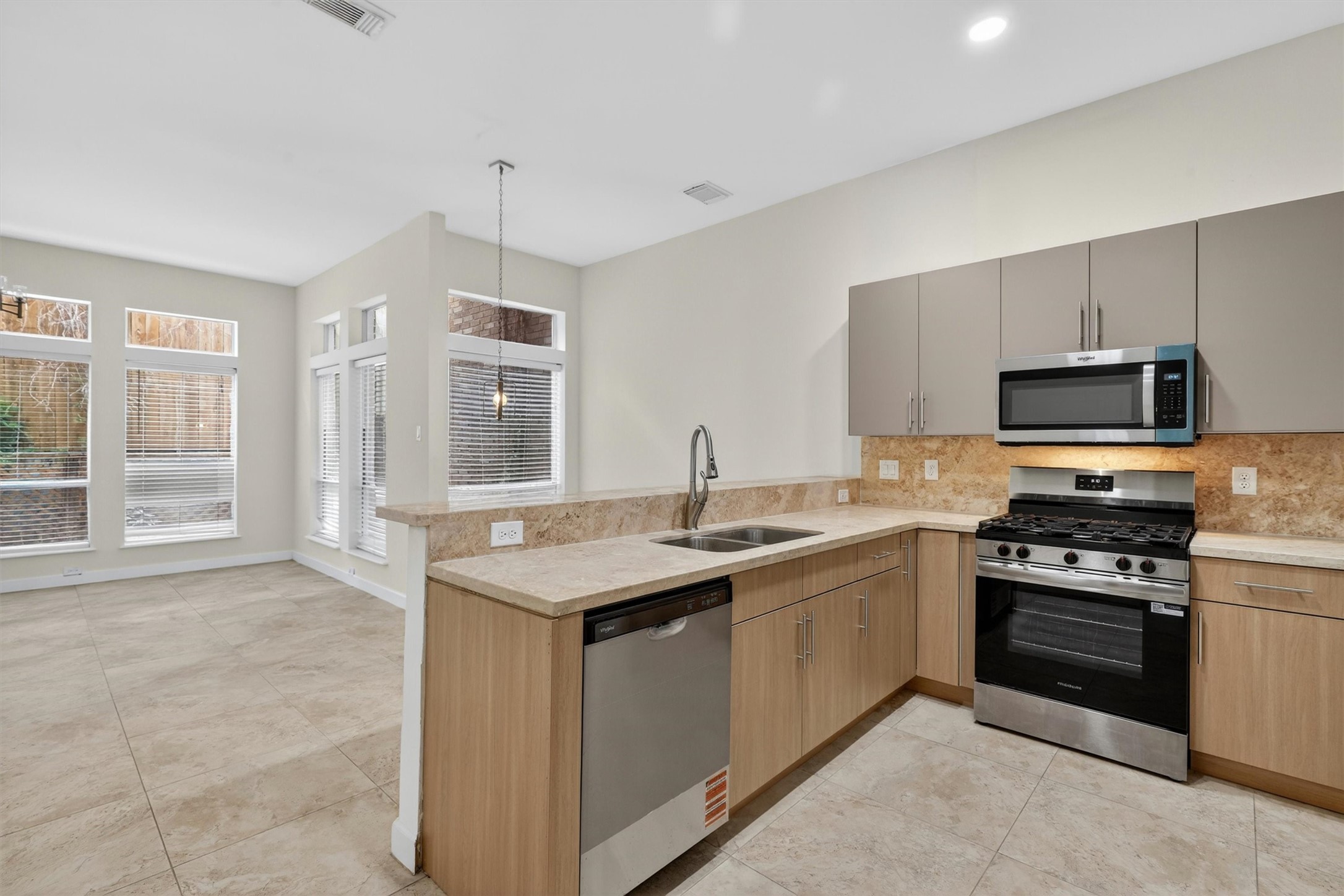 Open dining space ideal for entertaining with abundant natural light.