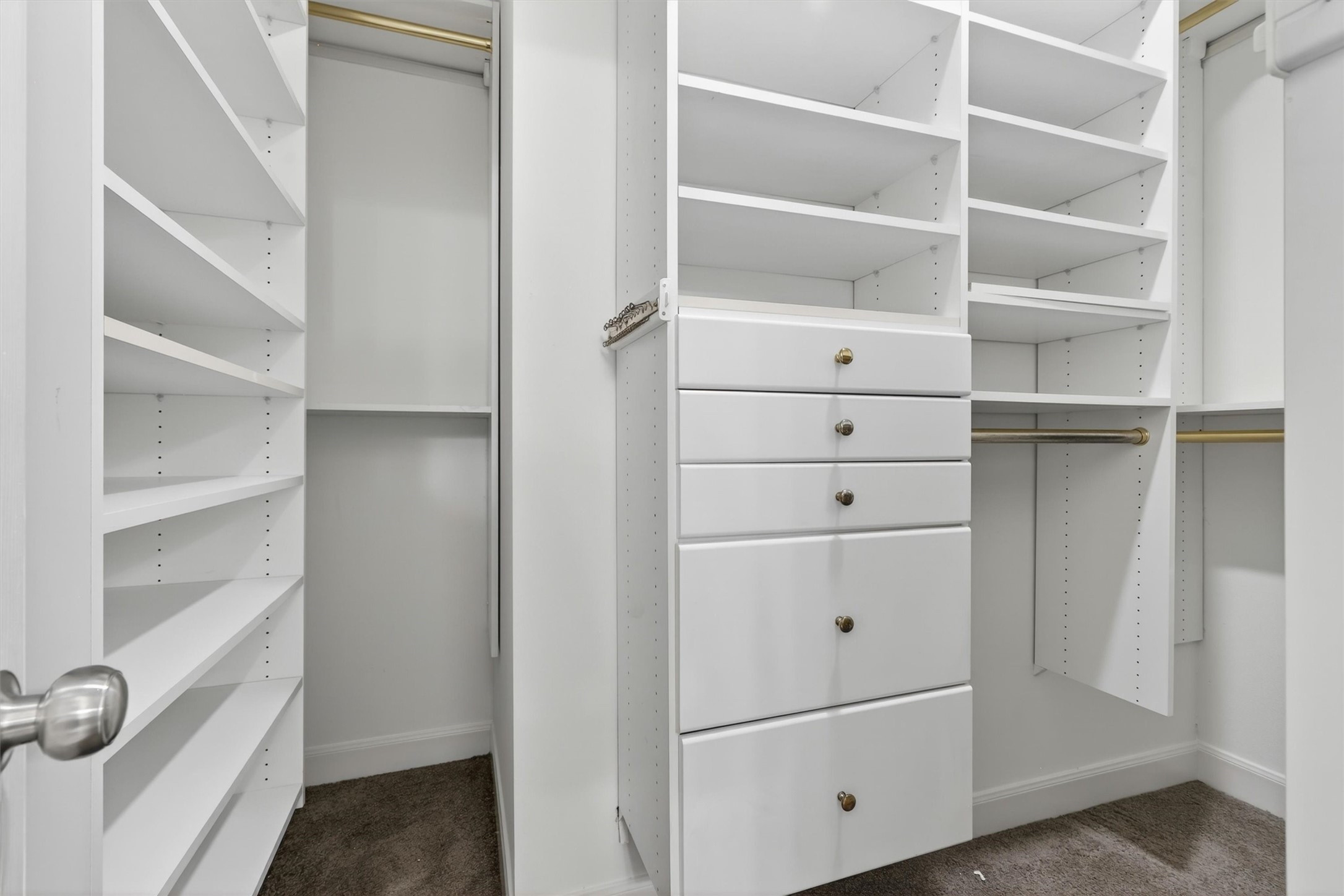 Custom built-in storage system designed for organization and convenience.