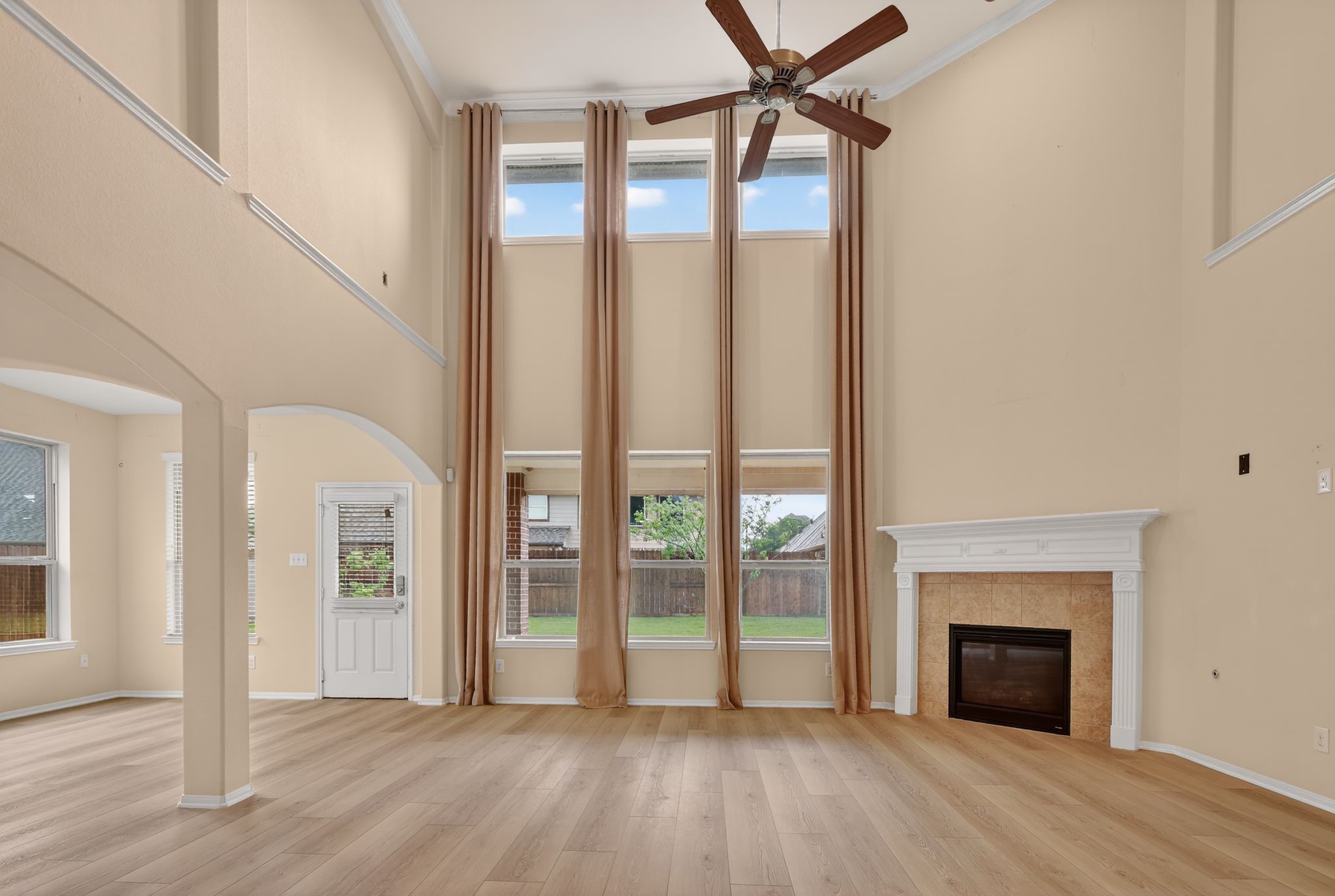Soaring living room ceilings with fireplace