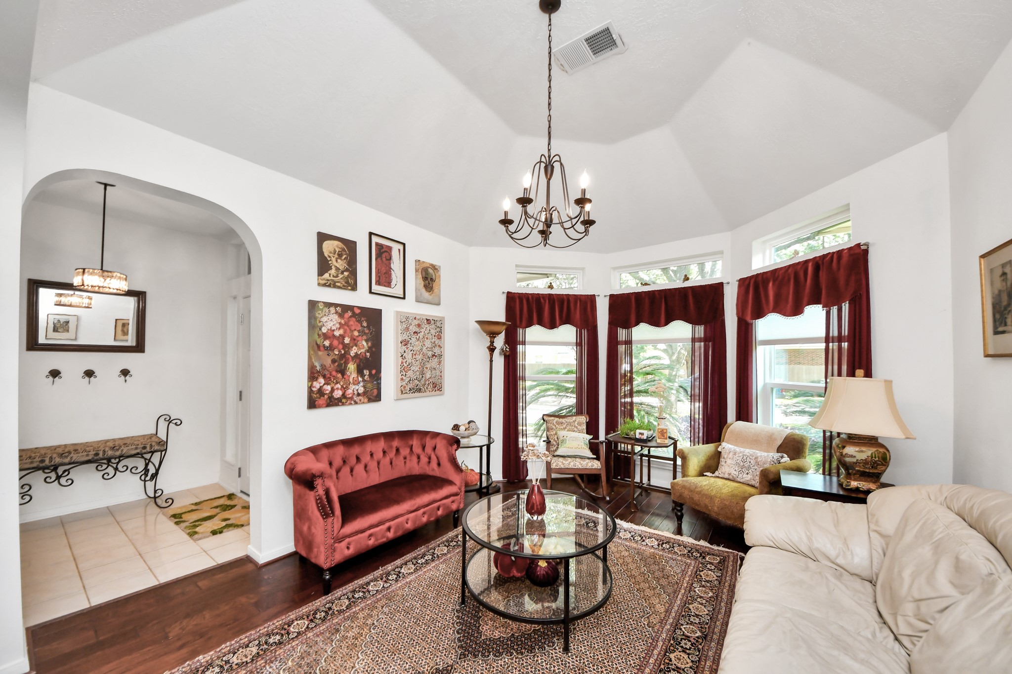Another view showing the size of the formal living room and its connection to the dining area.