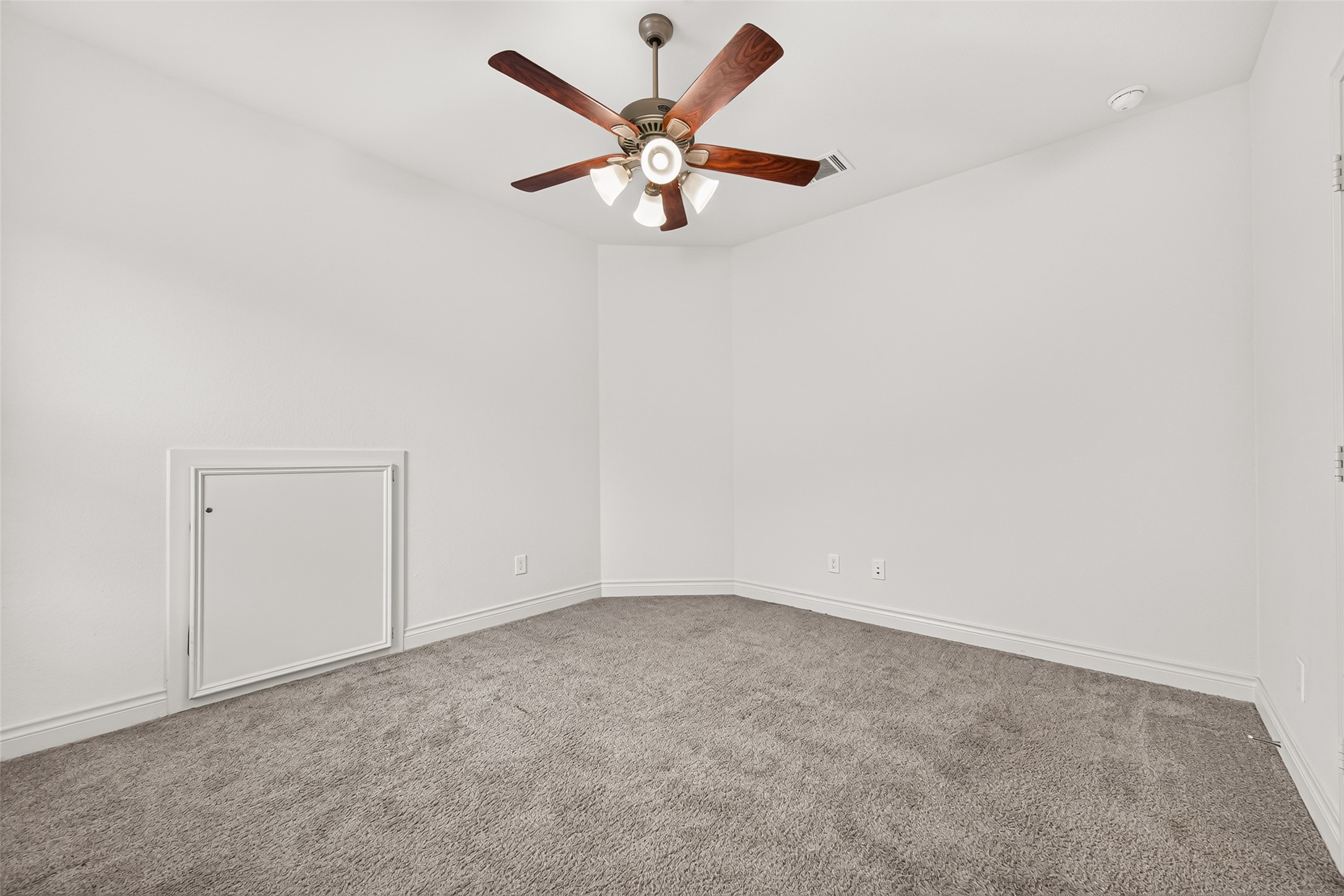 Second-floor secondary bedroom #3 featuring plush carpeting, generous space, and a comfortable layout
