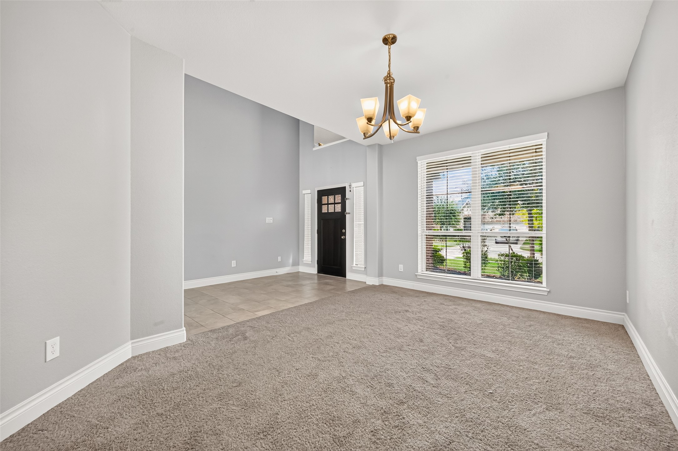 Elegant formal dining room designed for memorable gatherings, featuring a sophisticated setting ideal for hosting family dinners and special occasions