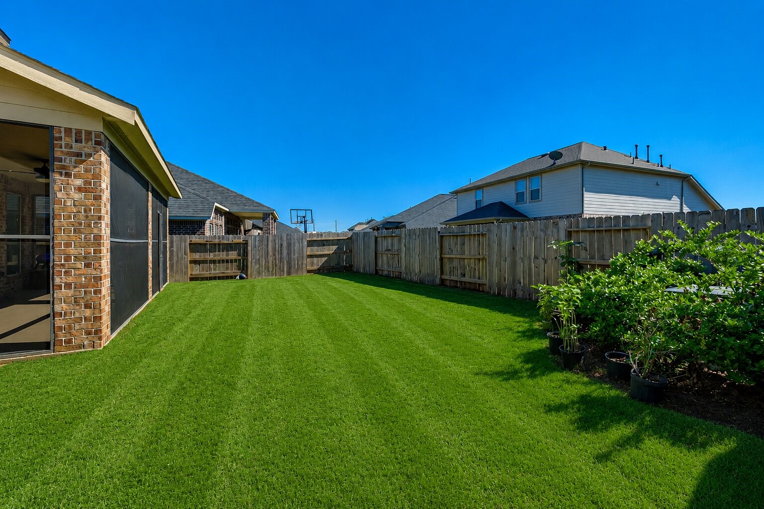 Enjoy relaxing evenings in the large screened-in patio offering a comfortable outdoor living space perfect for entertaining, dining, or unwinding year-round