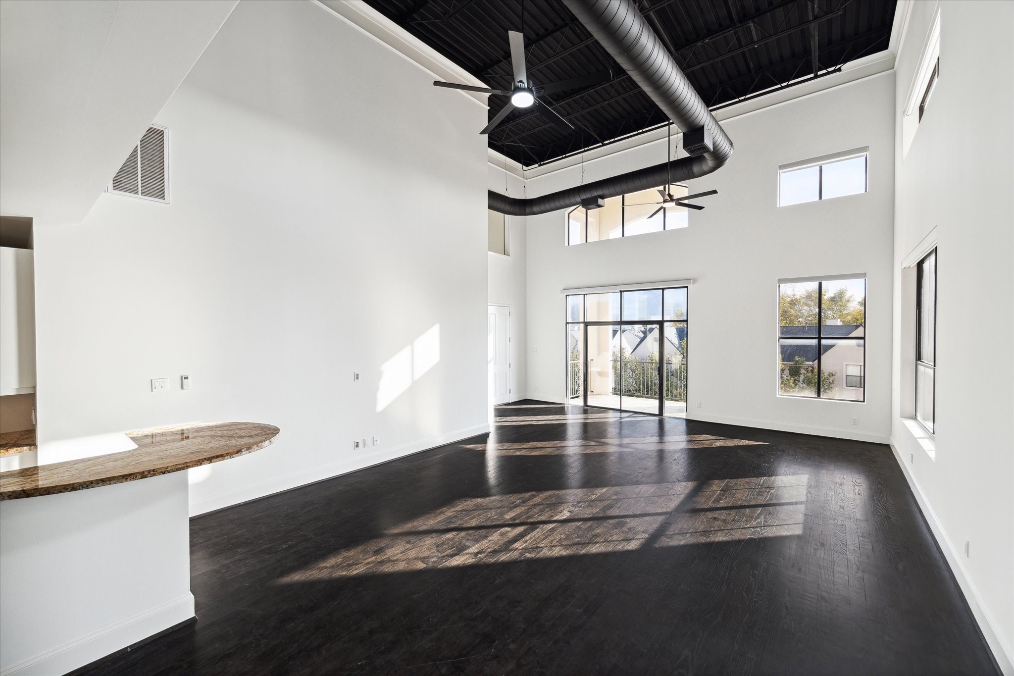Open living area with access to the balcony.