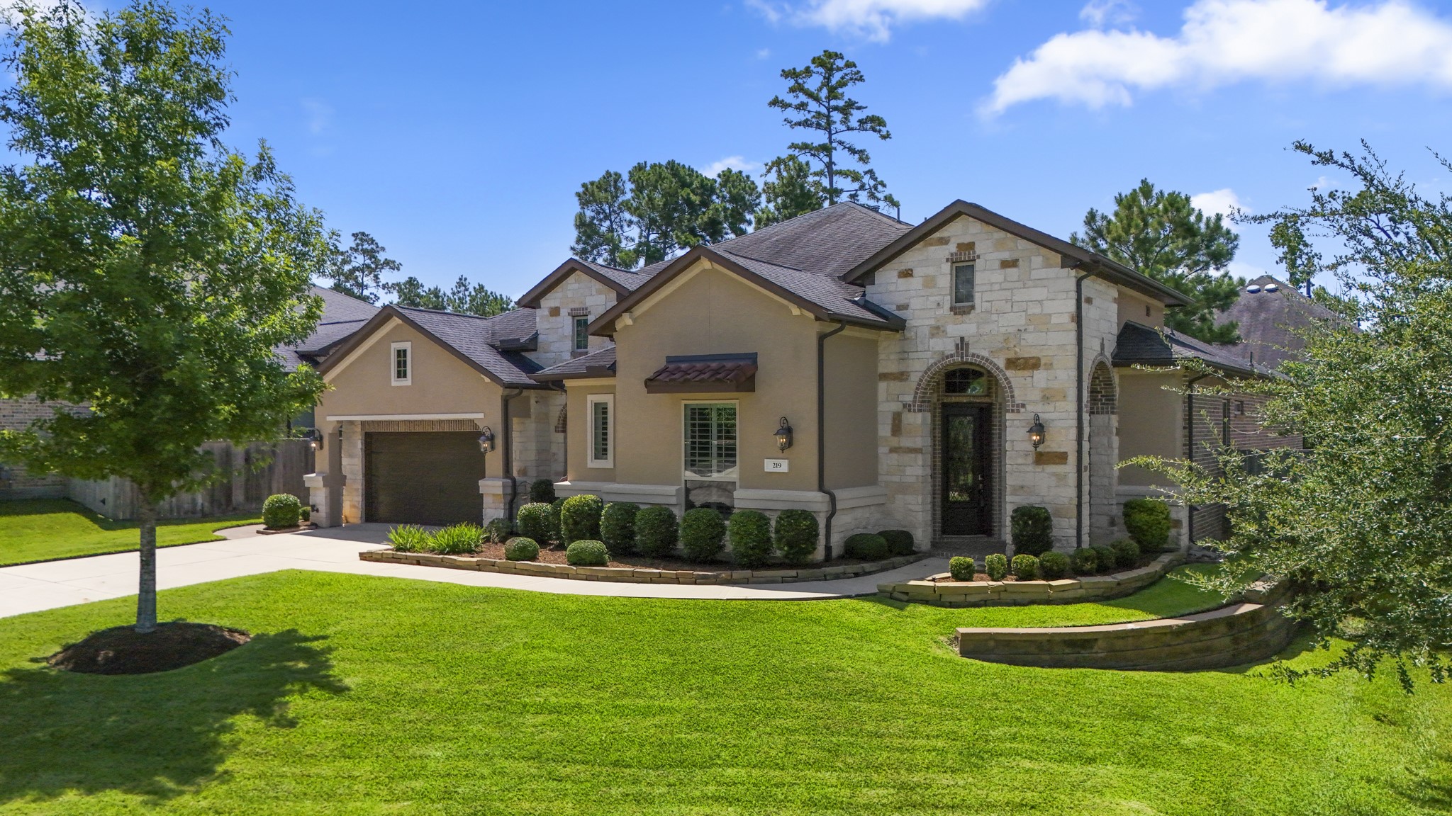219 Chirping Squirrel Court, Pinehurst, TX 77362