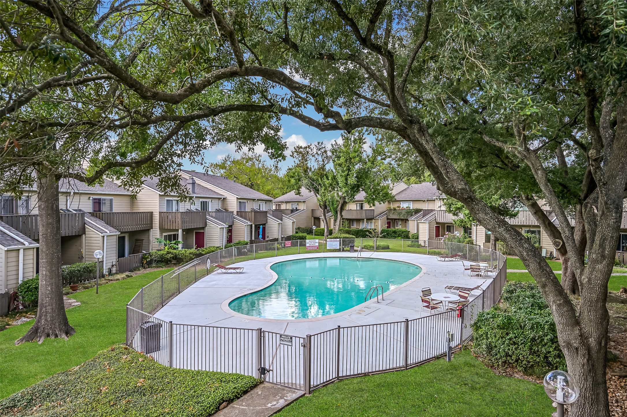 One of two swimming pools available to residents of Covered Bridge Condominiums! Surrounded by mature trees, landscaped grounds & neighboring residences, this community pool features a spacious deck with lounge chairs & seating areas. Enjoy a refreshing swim just steps from your condo!