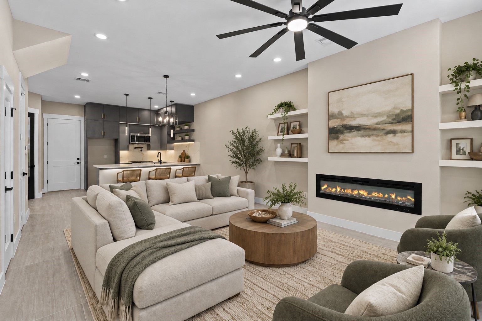 Virtually Staged: Offering a warm and inviting footprint, this main living area highlights clean architectural lines and integrated features. Built-in display shelving frames a ribbon fireplace, adding sophisticated style to the main seating area.