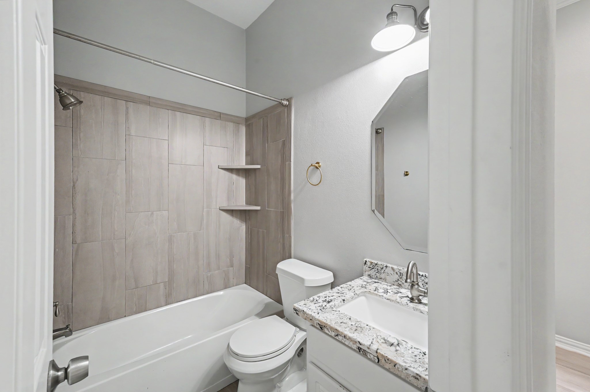 Full bathroom Located at the front of the home convenient to bedroom #2, office and common areas.