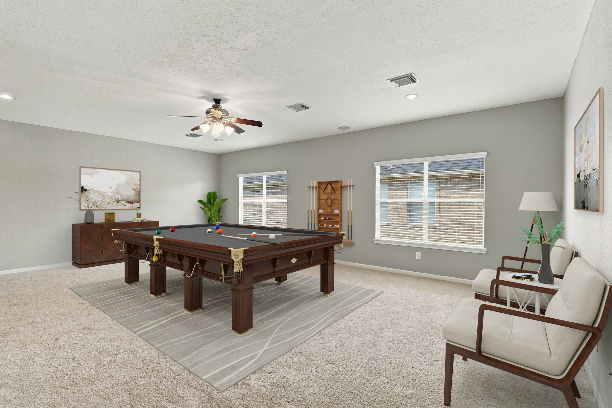 Virtually Staged: A spacious upstairs flex room offering plenty of versatility for a game room, media space, or additional living area. The open layout features soft neutral carpeting, light gray walls, recessed lighting, and a ceiling fan.