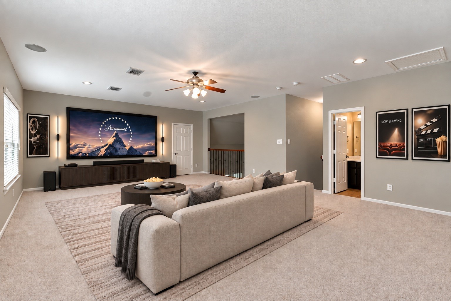 Virtually Staged: This spacious flex room offers endless possibilities. Its generous size makes it an ideal setting for a dedicated movie room or home theater.