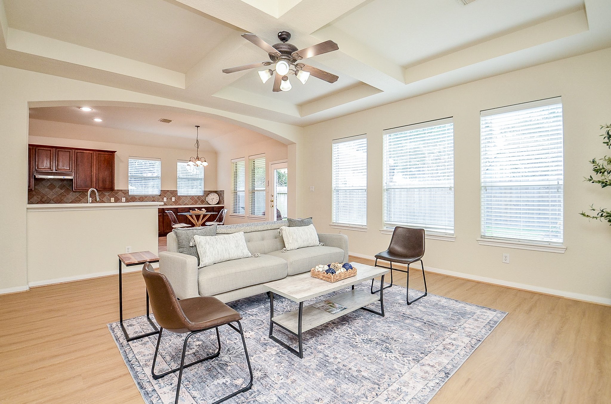 The best gathering spaces keep everyone connected. From the family room, conversation flows easily into the kitchen and breakfast area, creating a layout that works for weeknight dinners, weekend entertaining and everything in between.