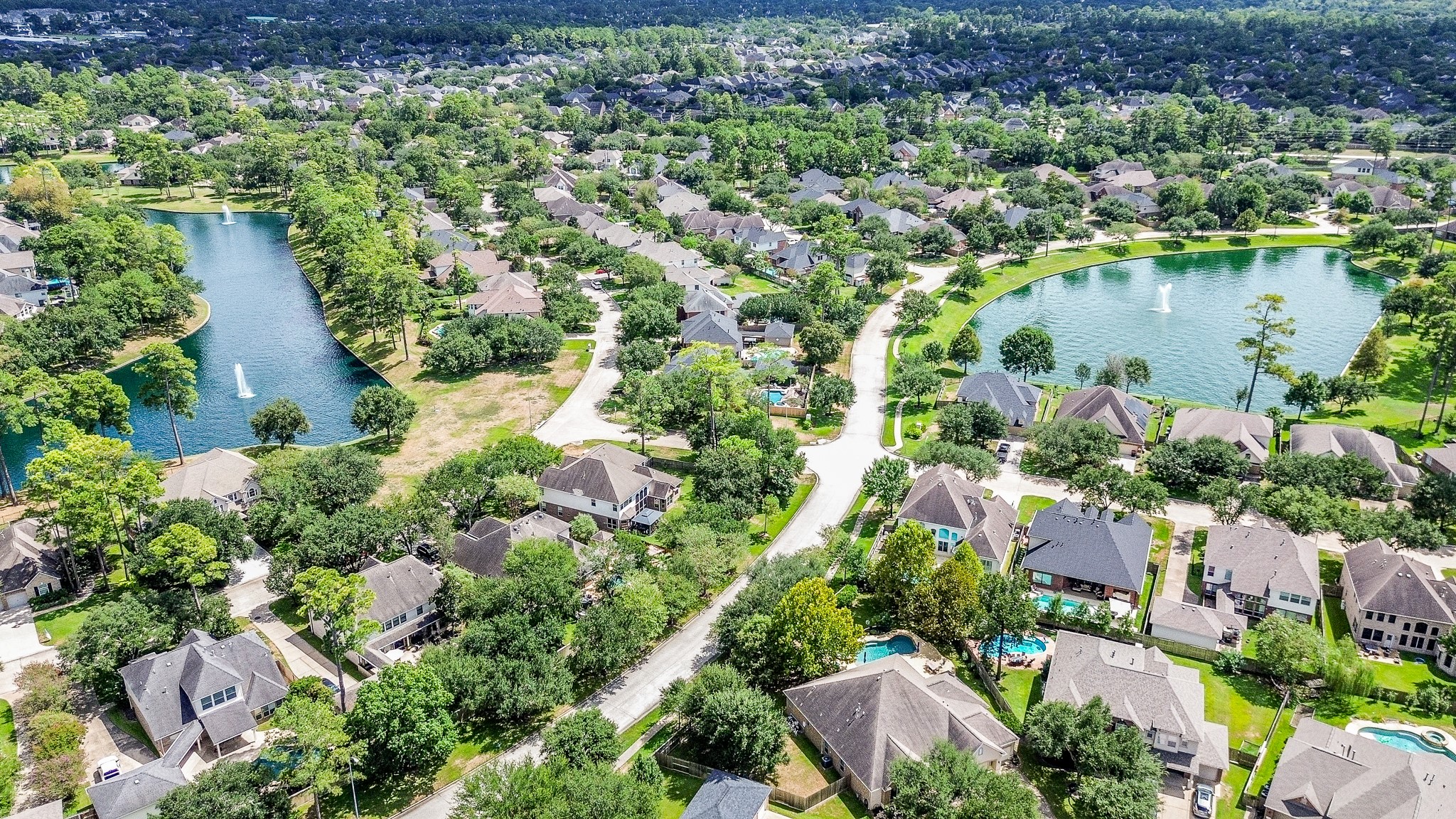 Northlake Forest is surrounded by mature trees and scenic lakes, giving 14407 Spanish River Lane a setting that feels established and inviting while still offering convenient access to the surrounding Cypress area.