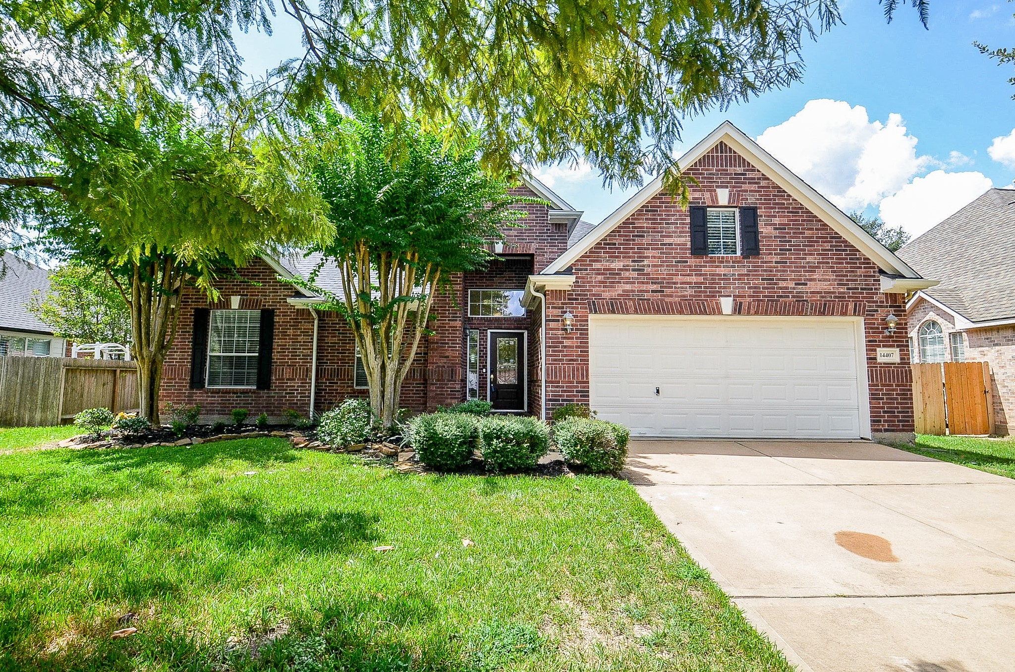 Mature trees, established landscaping and a classic brick exterior create a welcoming first impression. Tucked into Northlake Forest, this is a home that feels settled into its surroundings from the moment you arrive.