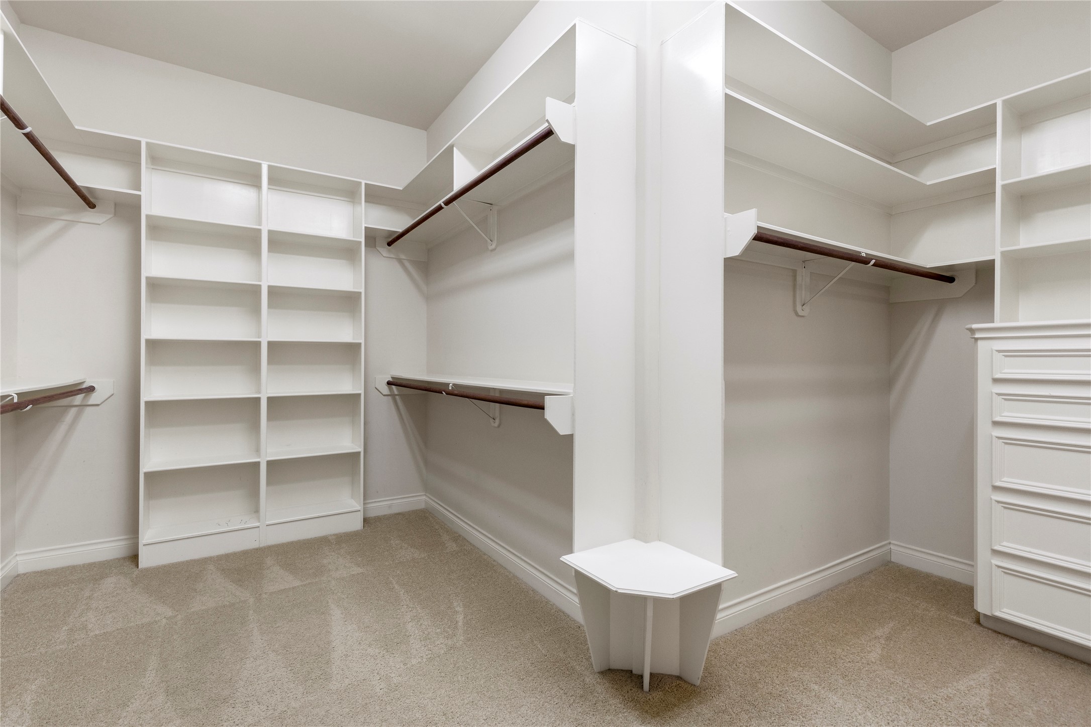 The oversized walk in closet provides exceptional storage with built in organization throughout.
