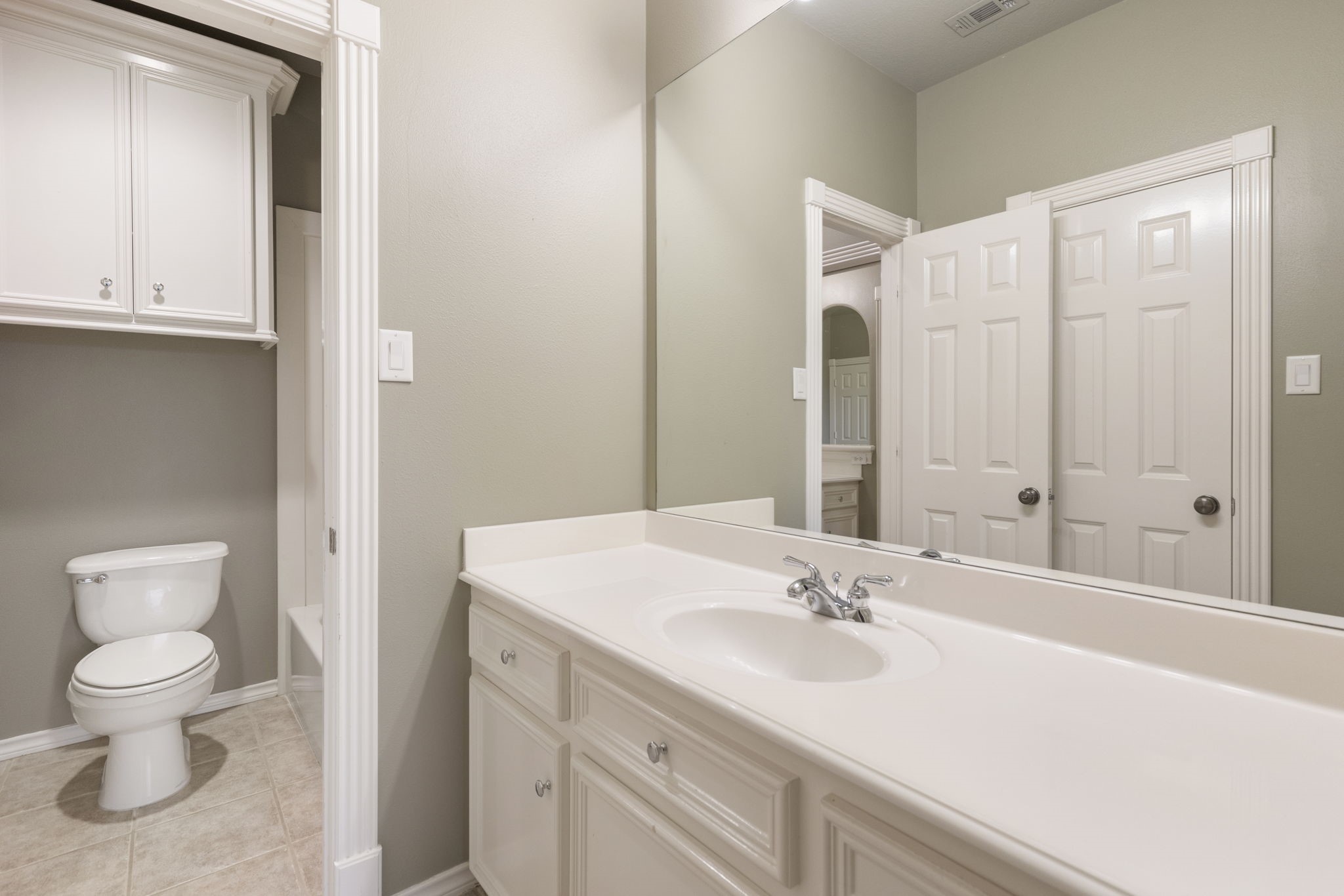 One of 2 full bathrooms adds convenience for the upstairs bedrooms and activity areas.