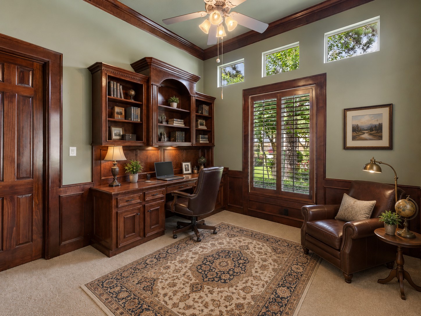 This private first floor room offers excellent flexibility with a closet and attached full bathroom, making it ideal as either a guest bedroom or a distinguished study. Rich millwork, tall ceilings, and plantation shutters give the space a refined presence, while its downstairs location provides comfort and convenience for guests or a quiet work from home retreat.