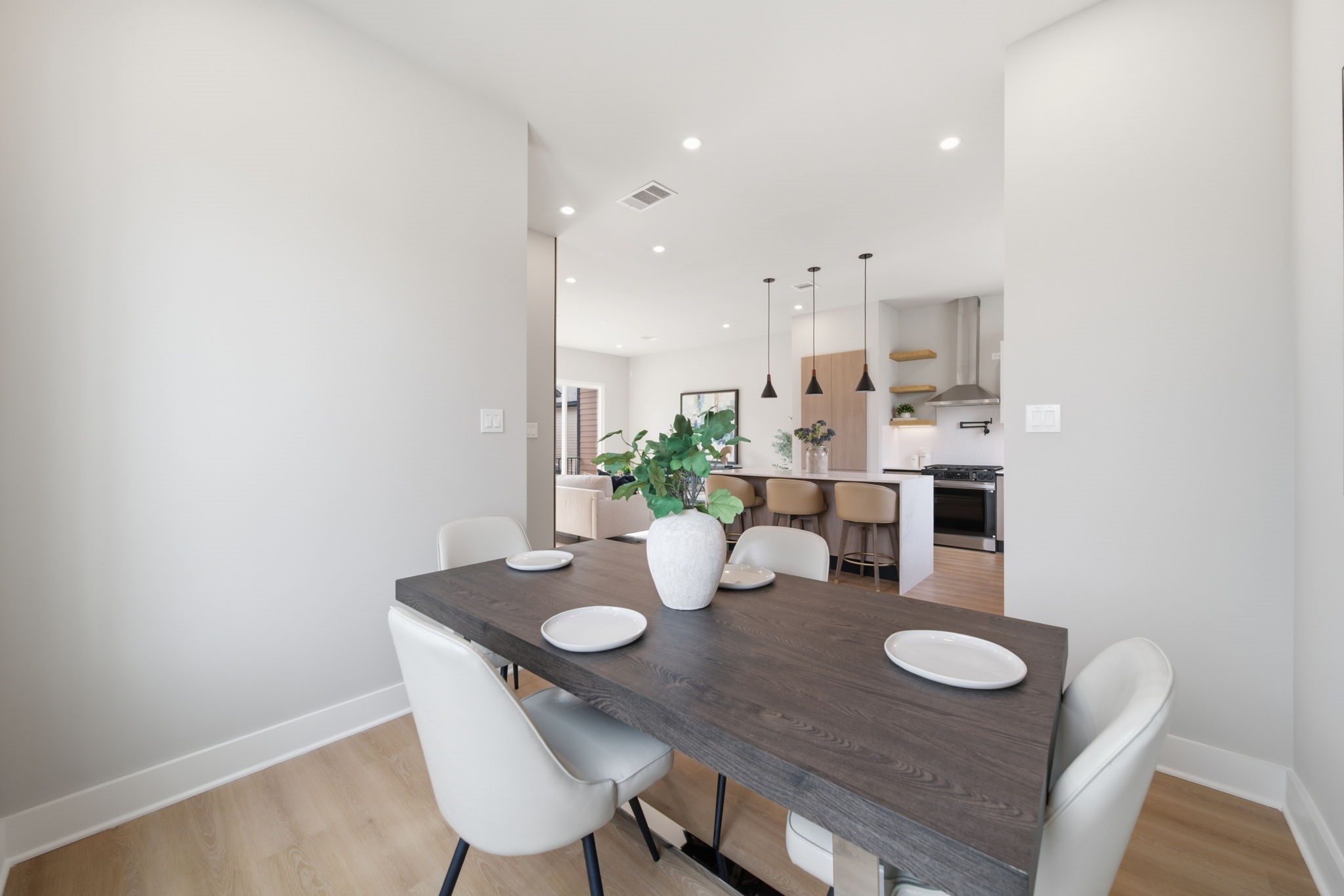 Open placement beside the kitchen creates an easy flow between cooking, dining, and gathering spaces.
