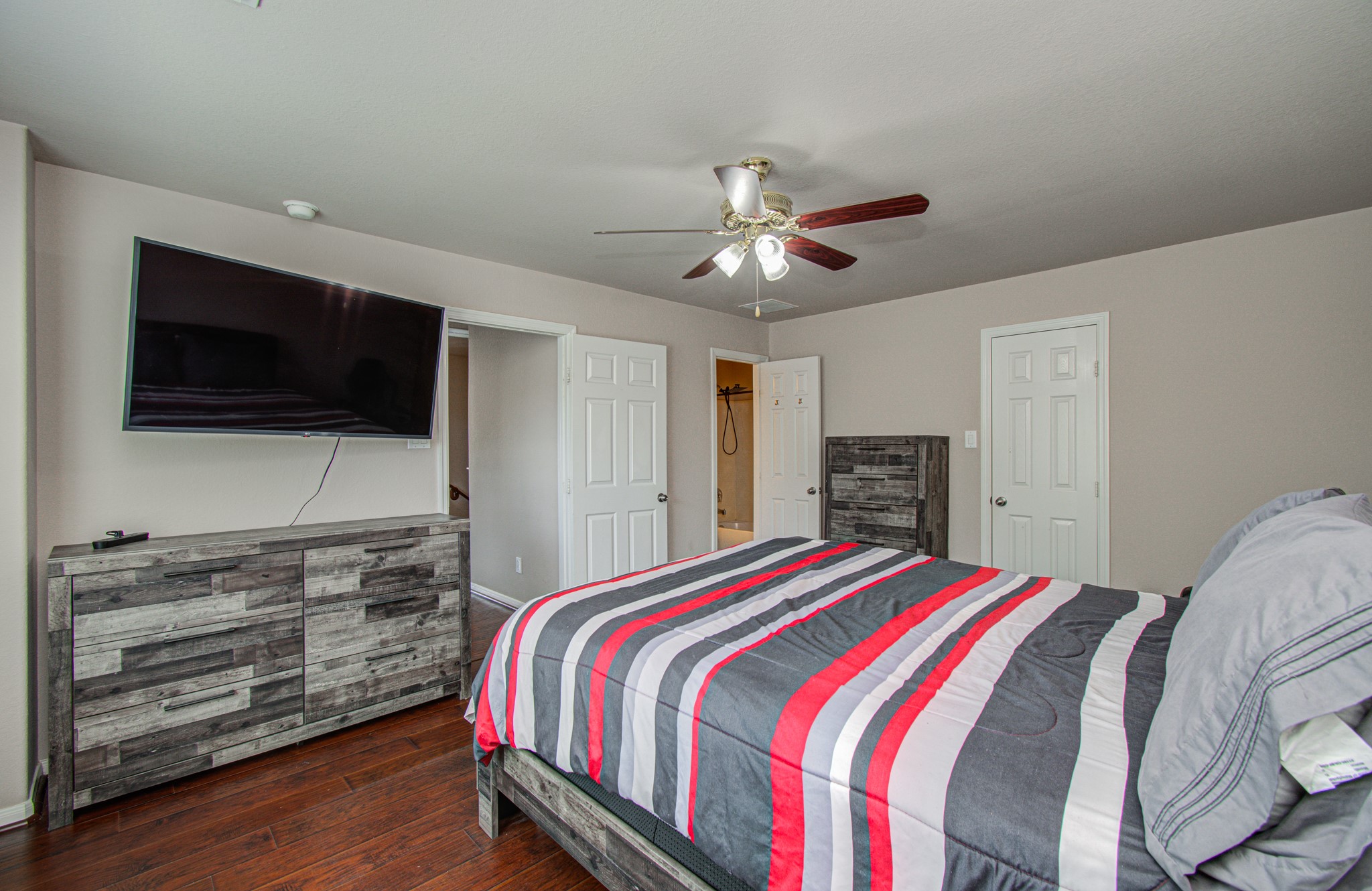 Discover added flexibility with a secondary primary bedroom conveniently located upstairs, complete with its own ensuite bathroom. This private retreat is ideal for multigenerational living, extended-stay guests, or anyone seeking additional separation and privacy within the home. Whether used as a second primary suite, guest retreat, or personal sanctuary, this versatile space offers possibilities to accommodate your lifestyle.