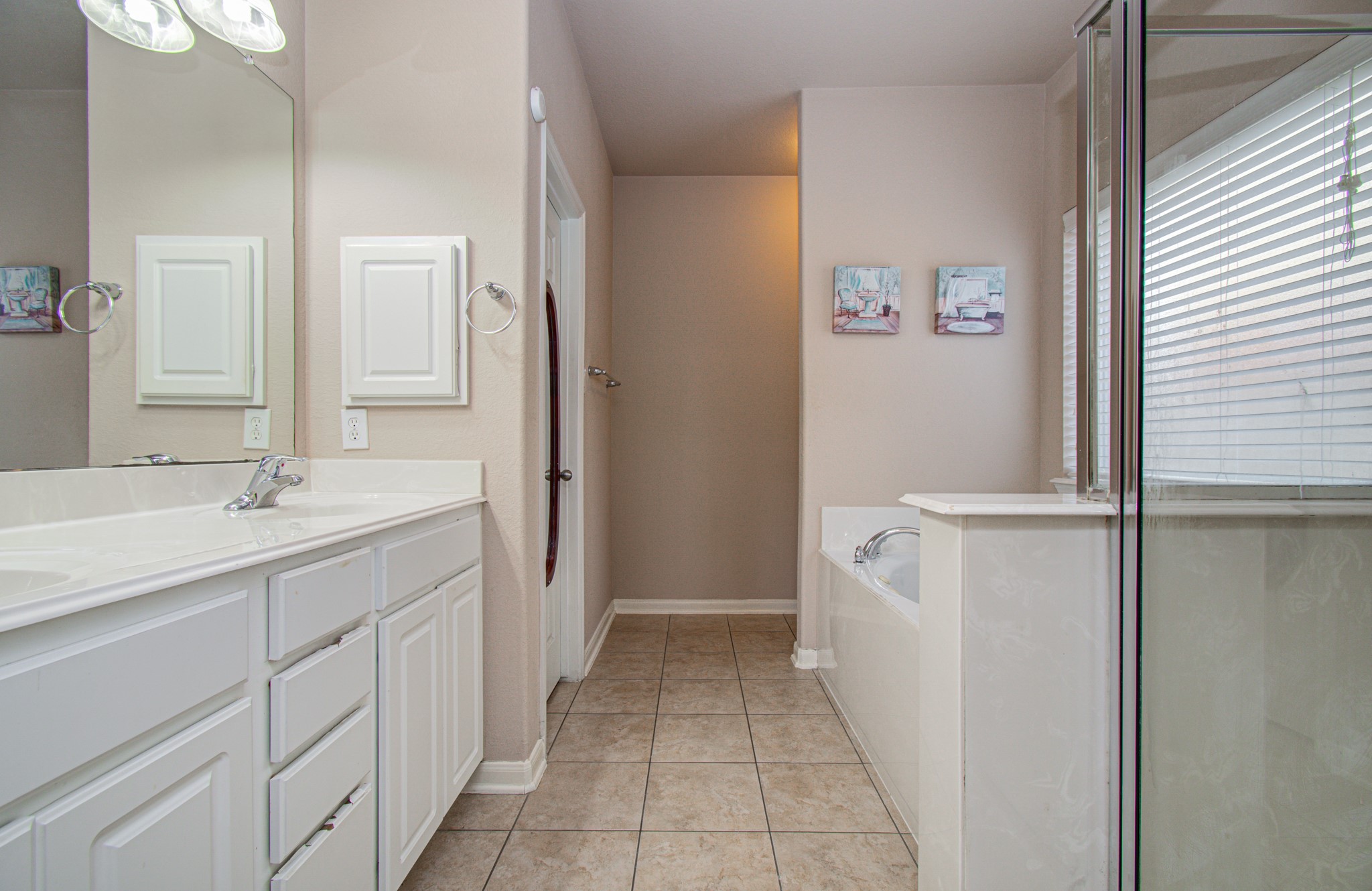 Create your own personal retreat in the primary bathroom, a space where everyday routines can feel a little more relaxing. Envision a refreshing start to the morning and a peaceful wind-down at the end of the day, with your favorite towels, accessories, and finishing touches. This private space offers the opportunity to bring your personal style to a comfortable, functional everyday retreat.