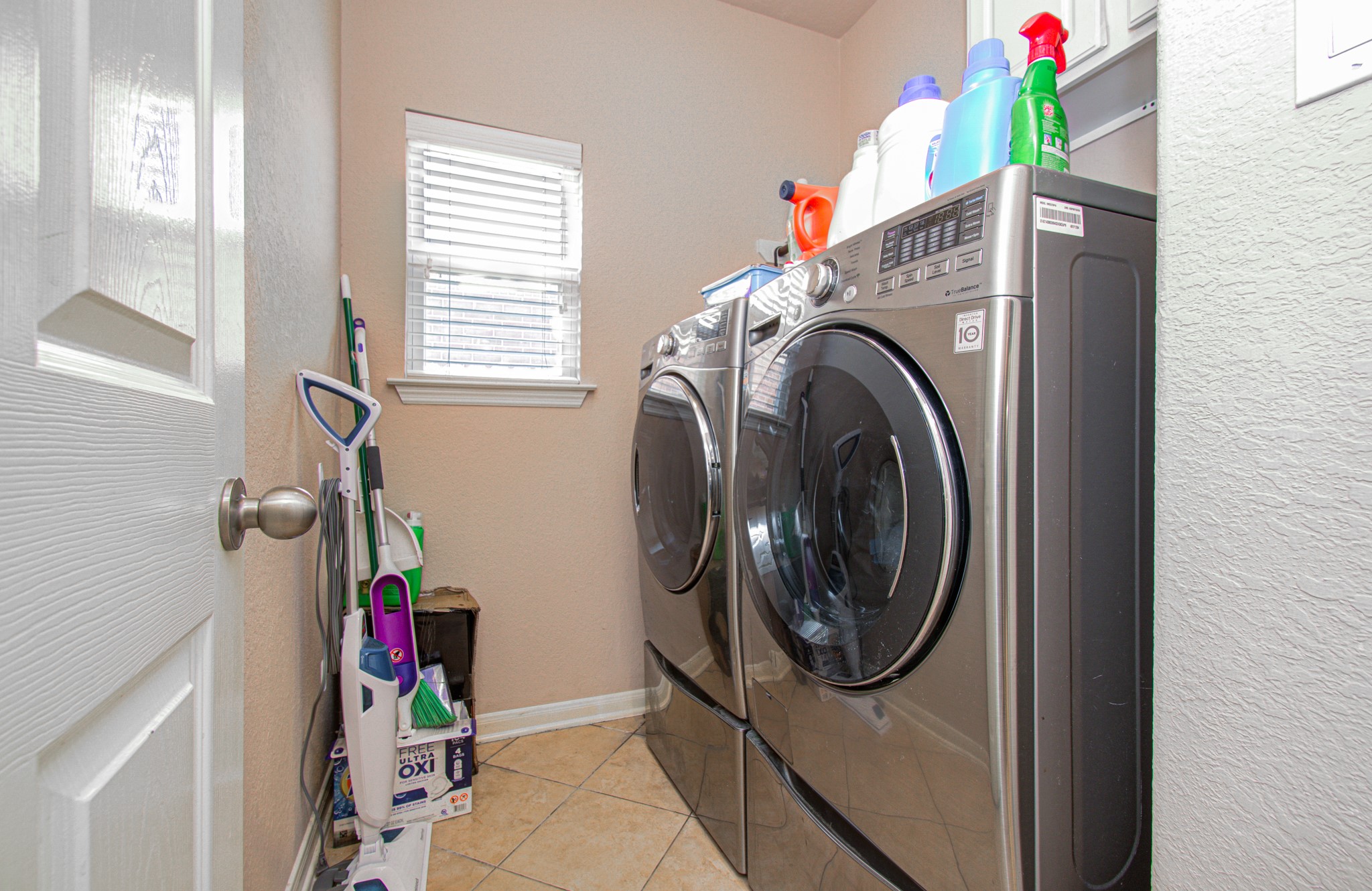 Enjoy the convenience of a dedicated first-floor laundry room that makes everyday chores easier to manage. With a designated space for washing, drying, and organizing laundry, this practical feature adds everyday convenience and functionality to the home.
