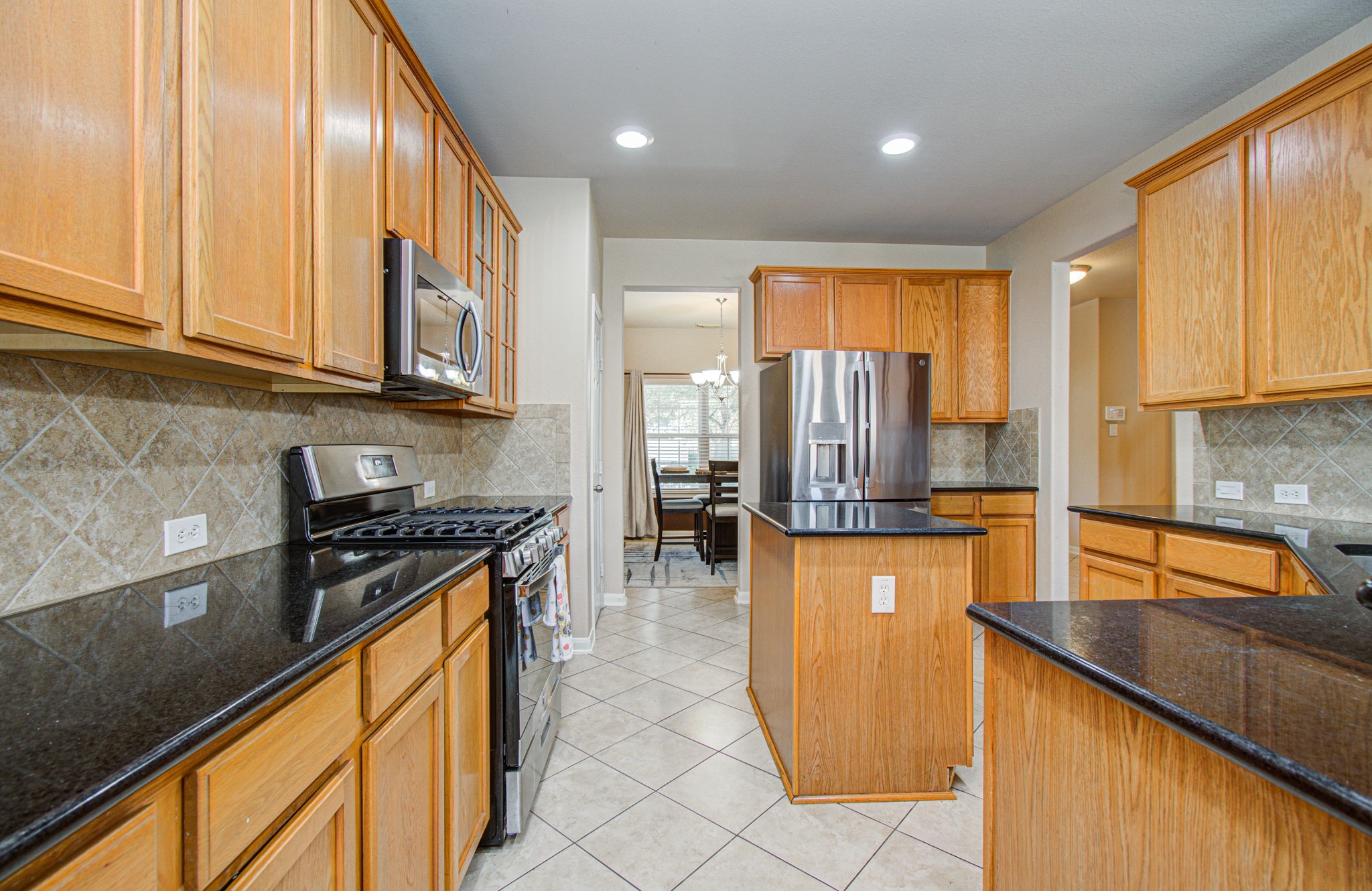 The kitchen is the heart of the home, offering an inviting space to prepare everyday meals, gather with loved ones, and entertain guests. With its connection to the home's living spaces, this area provides the opportunity to create a kitchen experience tailored to your lifestyle, whether you're preparing a quick breakfast or hosting a memorable dinner. Imagine the possibilities for making this essential space your own!