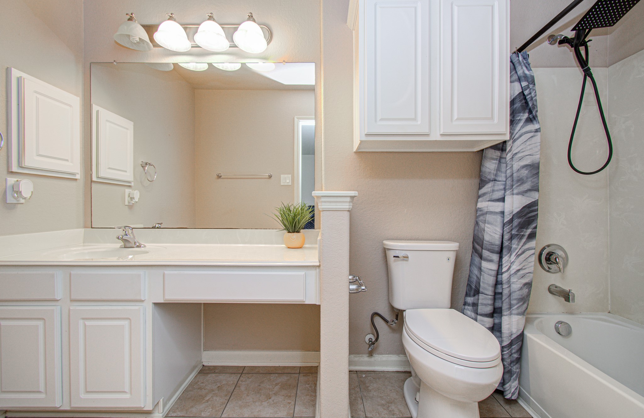 Enjoy the convenience and privacy of an ensuite bathroom adjoining the upstairs secondary primary bedroom. This thoughtful feature creates a more independent living experience for household members or overnight guests, making the space especially appealing for multigenerational living or hosting visitors. Comfort, convenience, and flexibility come together in this valuable addition to the home's layout.