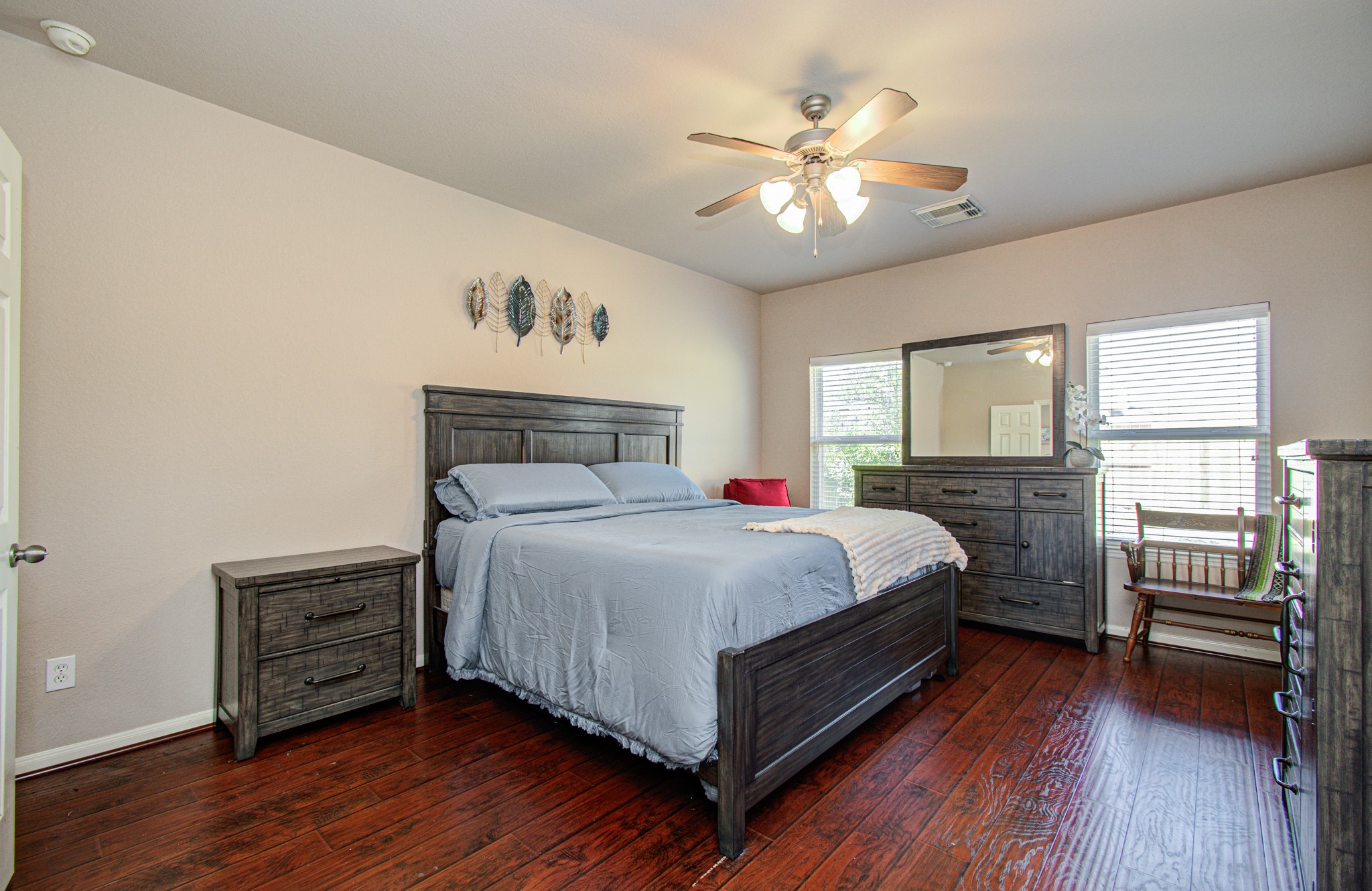 Retreat to the primary bedroom, your own private space to unwind and recharge at the end of the day. This spacious-feeling retreat offers the potential for a relaxing bedroom sanctuary, with room to create a comfortable sleeping area and a personalized sitting or reading nook, depending on your furniture needs. Enjoy the opportunity to transform this space into the peaceful escape you've been looking for.