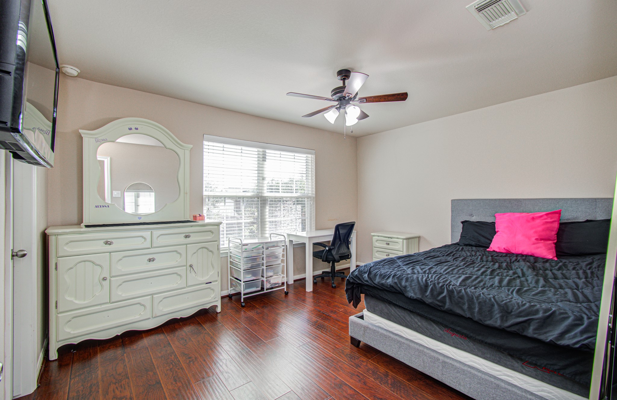 The upstairs layout includes two additional secondary bedrooms offering versatile space for guests, a home office, hobbies, or other personal needs. These rooms provide flexibility to accommodate your lifestyle, whether you need dedicated work-from-home space or comfortable accommodations for family and visitors.