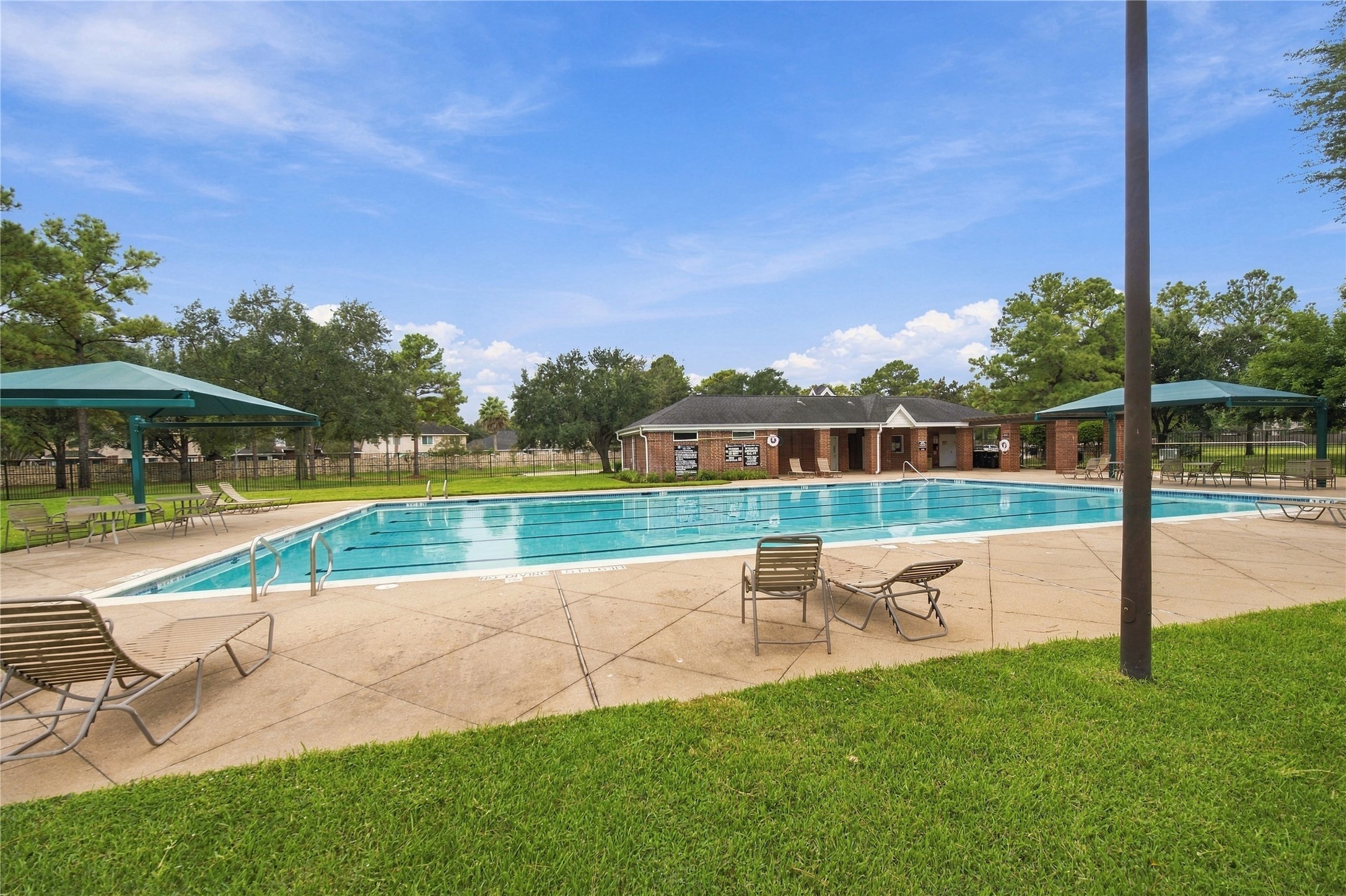 Residents enjoy a beautiful community pool, perfect for relaxing on warm Texas days.