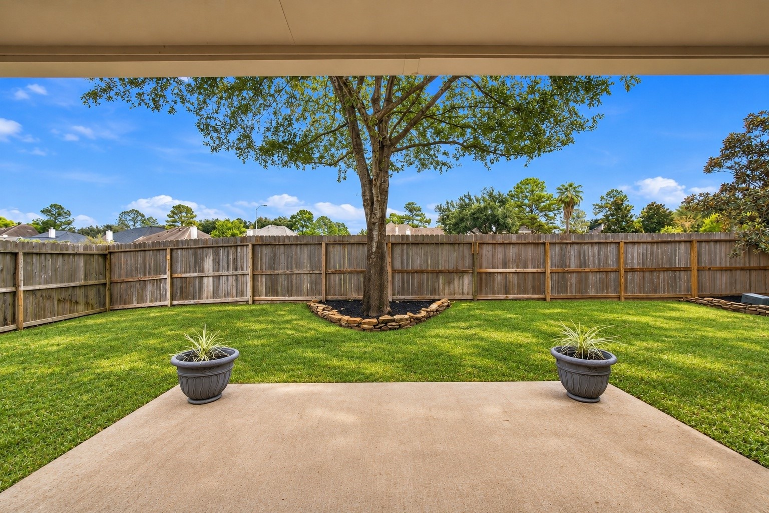Relax and enjoy the shady view from the covered patio while watching the kids play in the backyard.  Or, gather with family and friends for a cookout on the extended patio.  There's plenty of room for your favorite outdoor furniture!