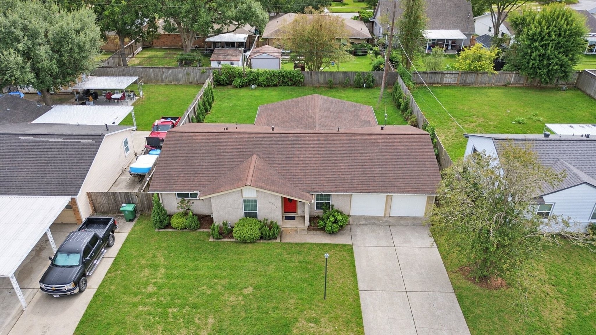 Saxon has double wide driveway and dual garage doors with separate motors.
