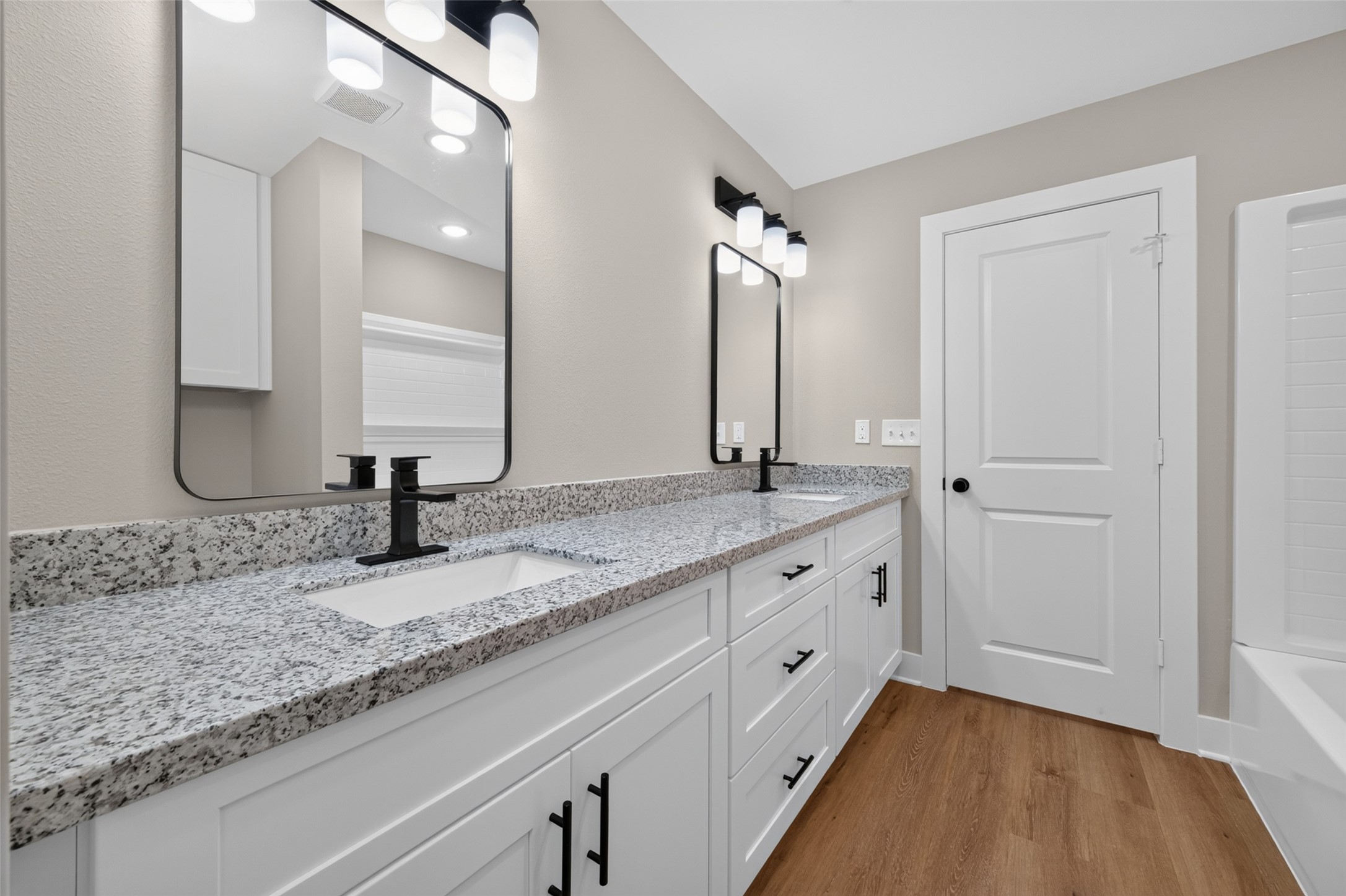 Master bathroom has shower/tub combo.