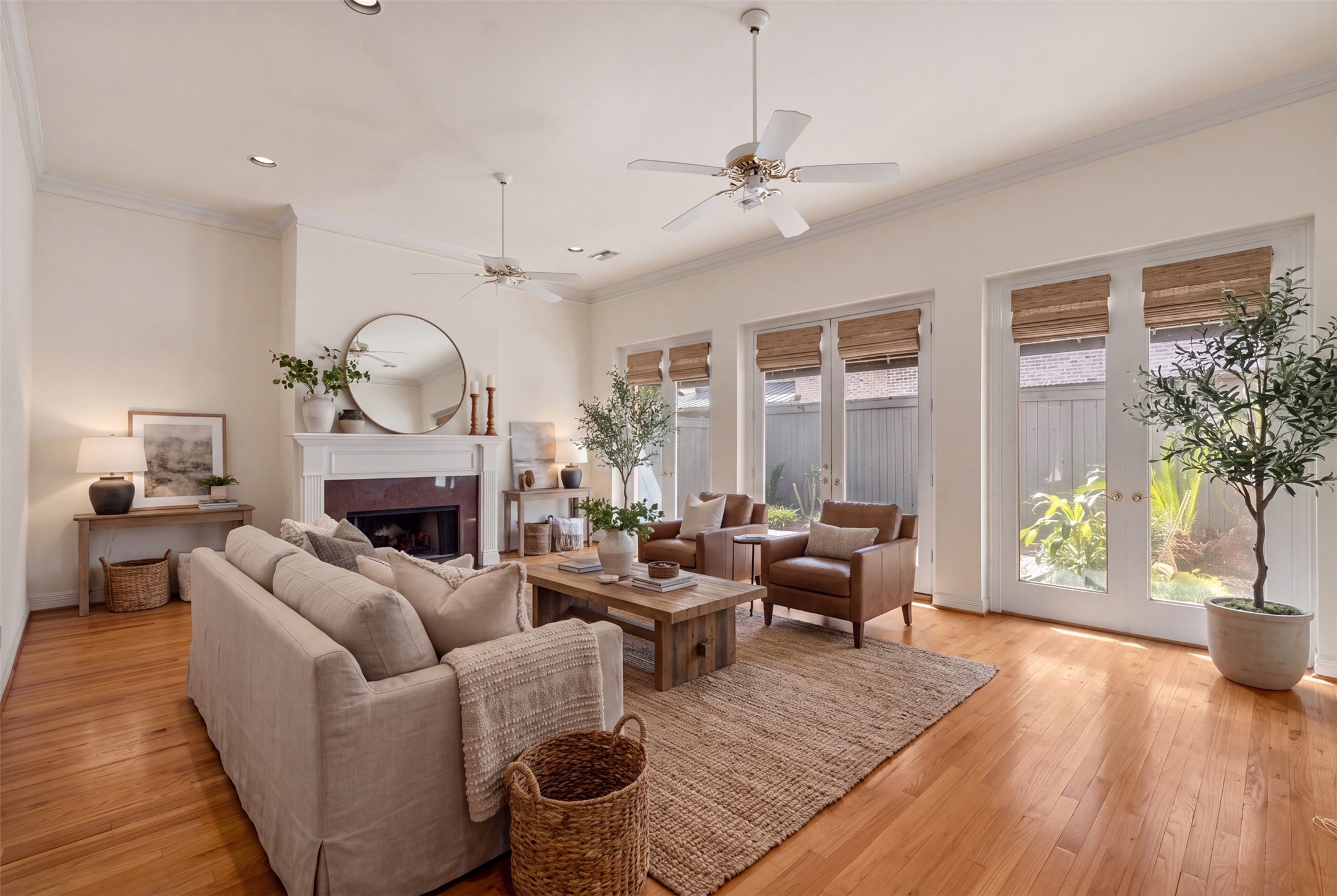 This spacious living area features an expansive open-concept layout, perfect for both comfortable daily living and large-scale entertaining. With abundant natural light. AI photo suggesting furnishings.