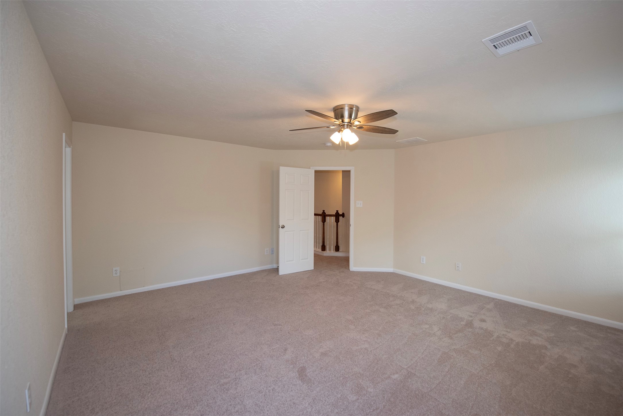 Look at the space in this bedroom! Plenty of room for your king sized furniture with space for a sitting area.