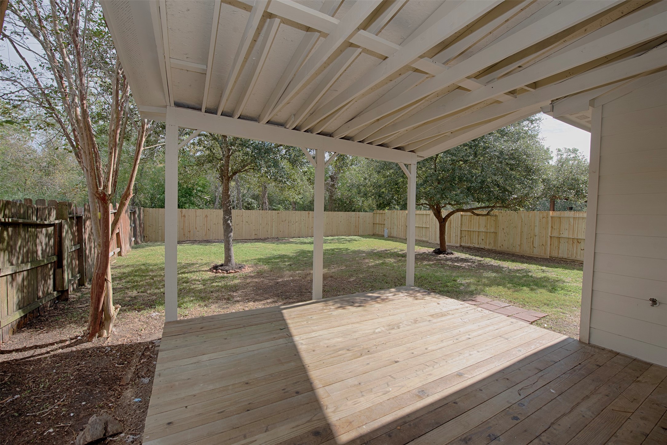 Another view of the back patio open to the yard. Imagine the great BBQ parties with friends and family!
