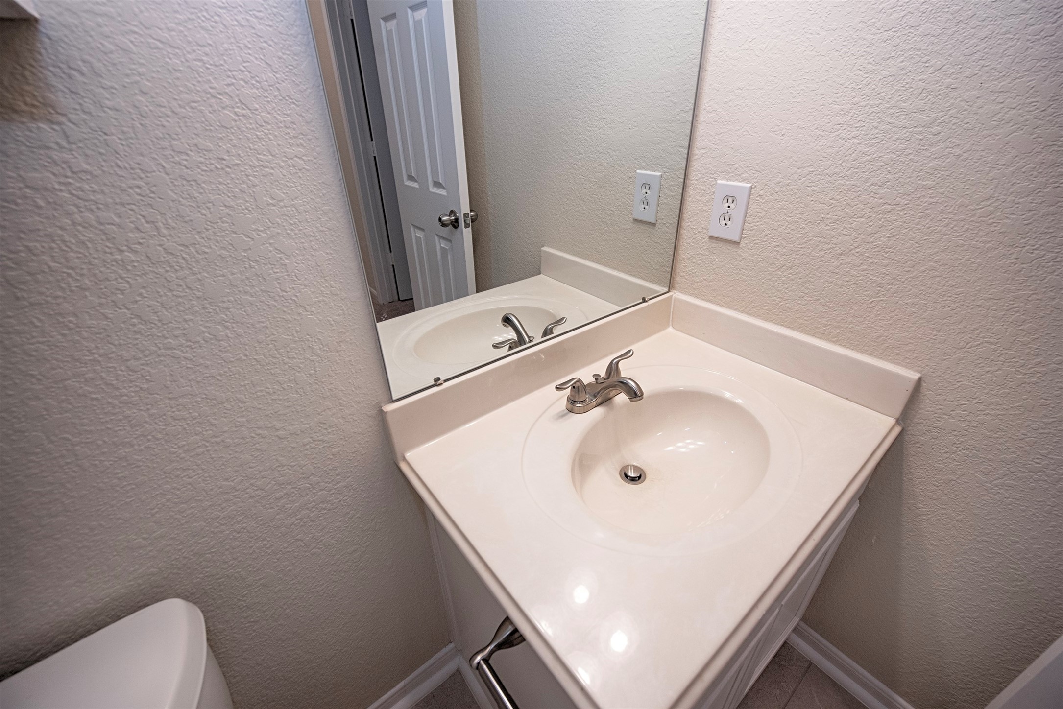 Another view of the bathroom between the second and third bedroom.