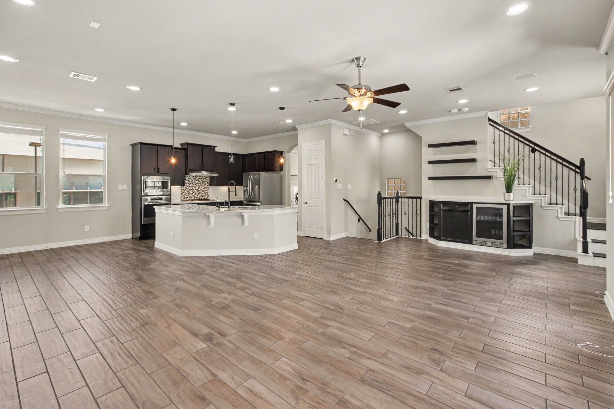 Bright and spacious second-floor living area with an open-concept layout