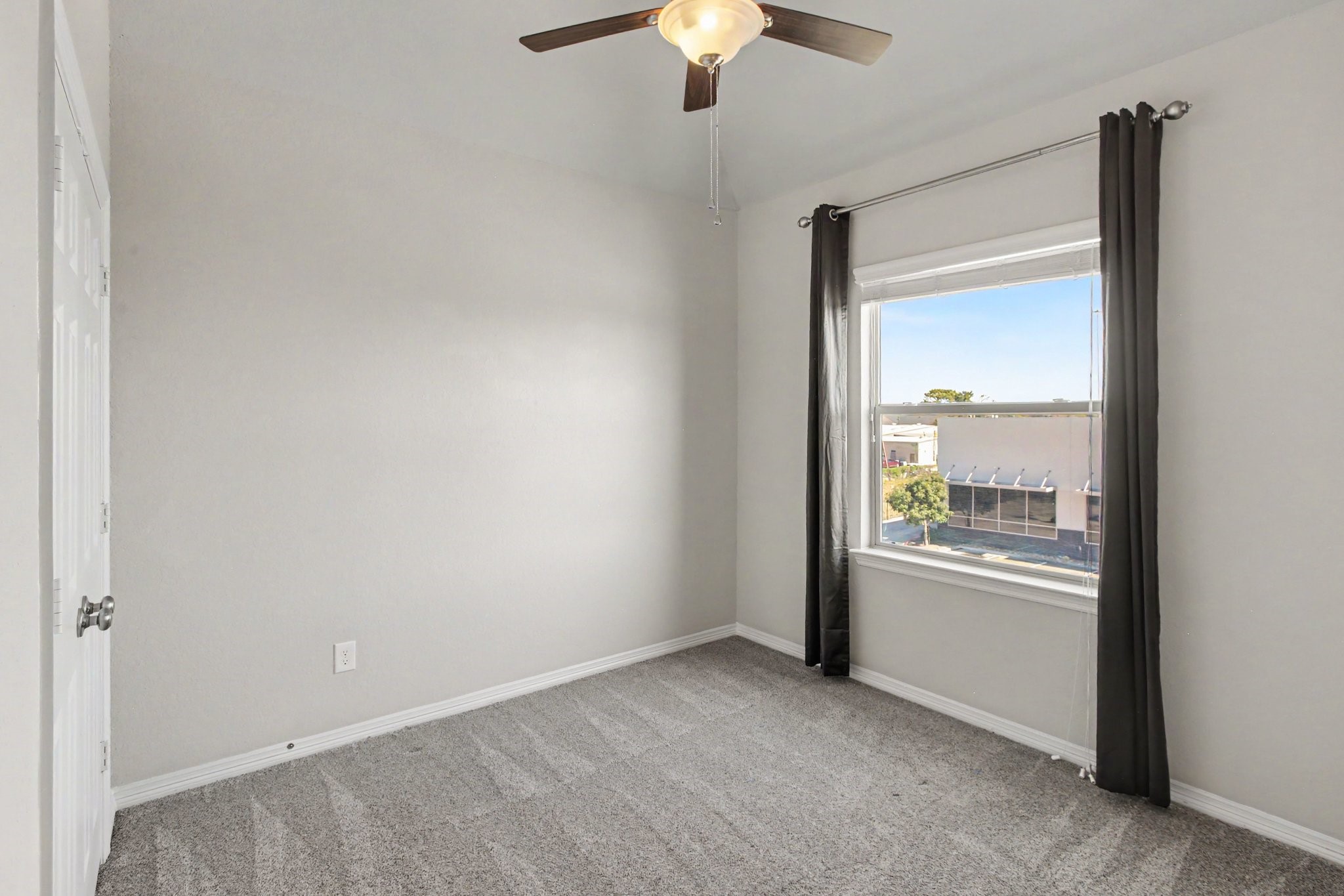 This is one of two secondary bedrooms on the 3rd floor with a shared Jack-n-Jill bathroom