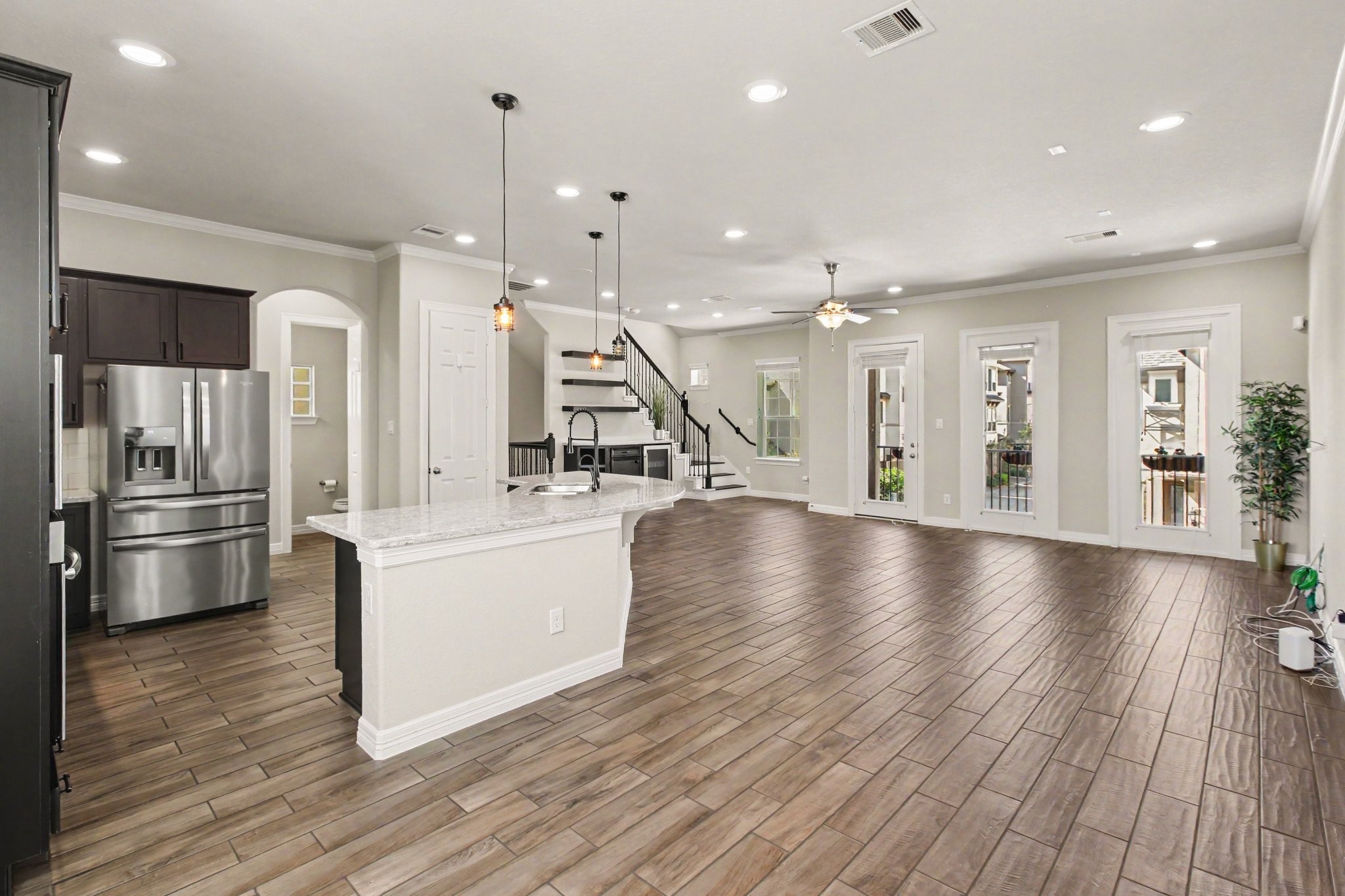 Bright and spacious second-floor living area with an open-concept layout