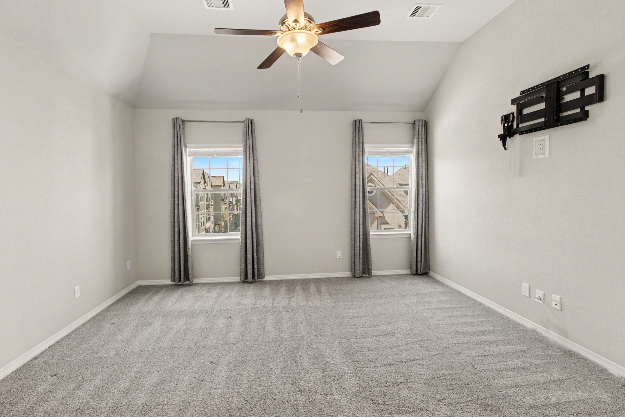 The spacious primary bedroom on the 3rd floor