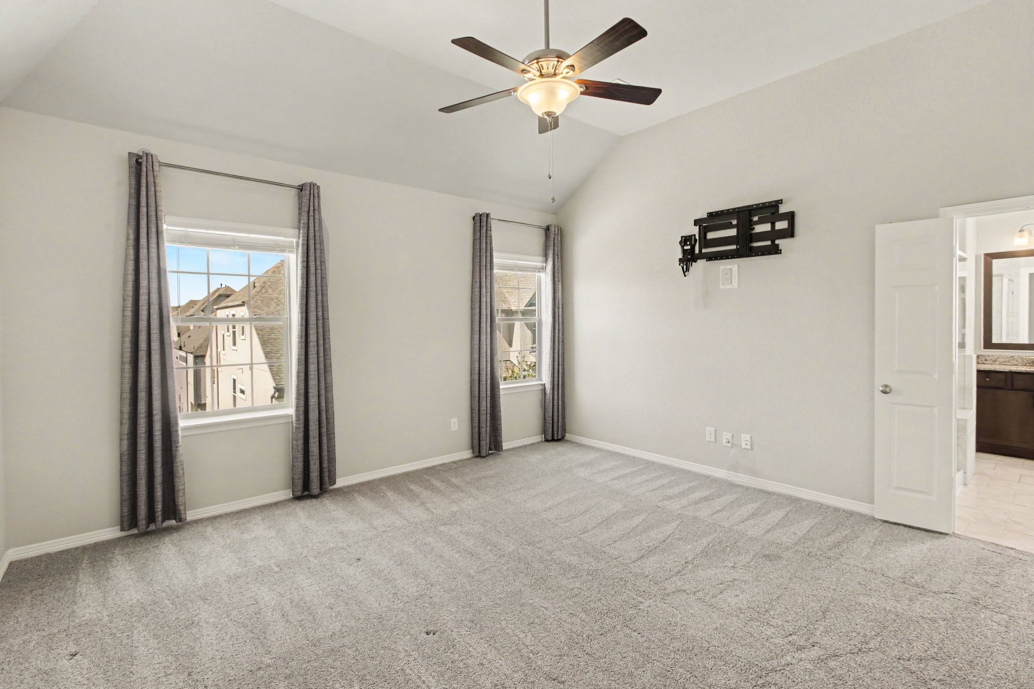 The spacious primary bedroom on the 3rd floor