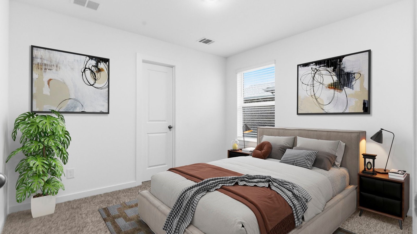 Comfortable guest bedroom featuring neutral-toned walls, carpeted flooring, and a separate closet.