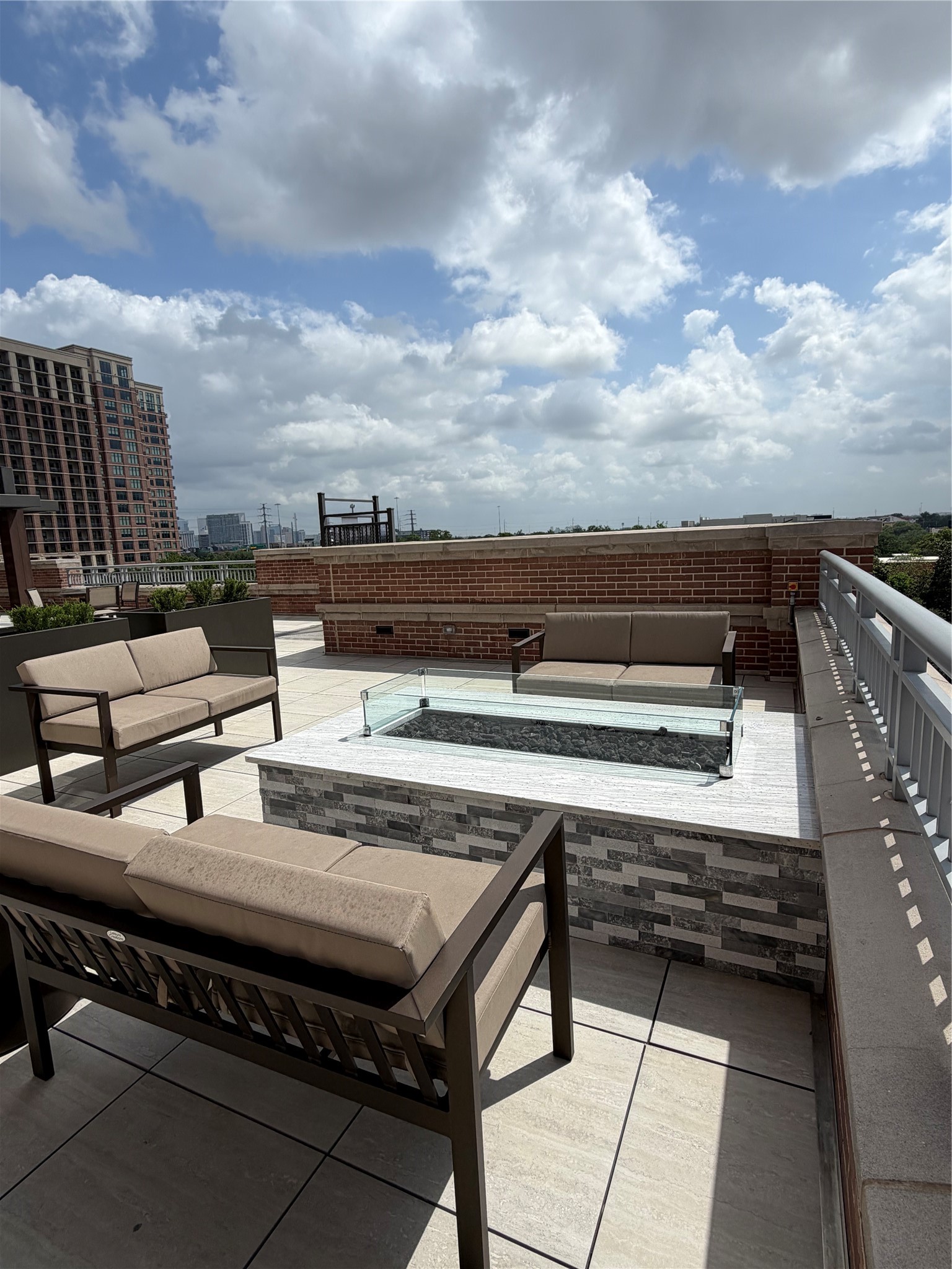 The outdoor area is designed with several areas - covered dining area, sun area, outdoor kitchen and a fire pit with an amazing view.