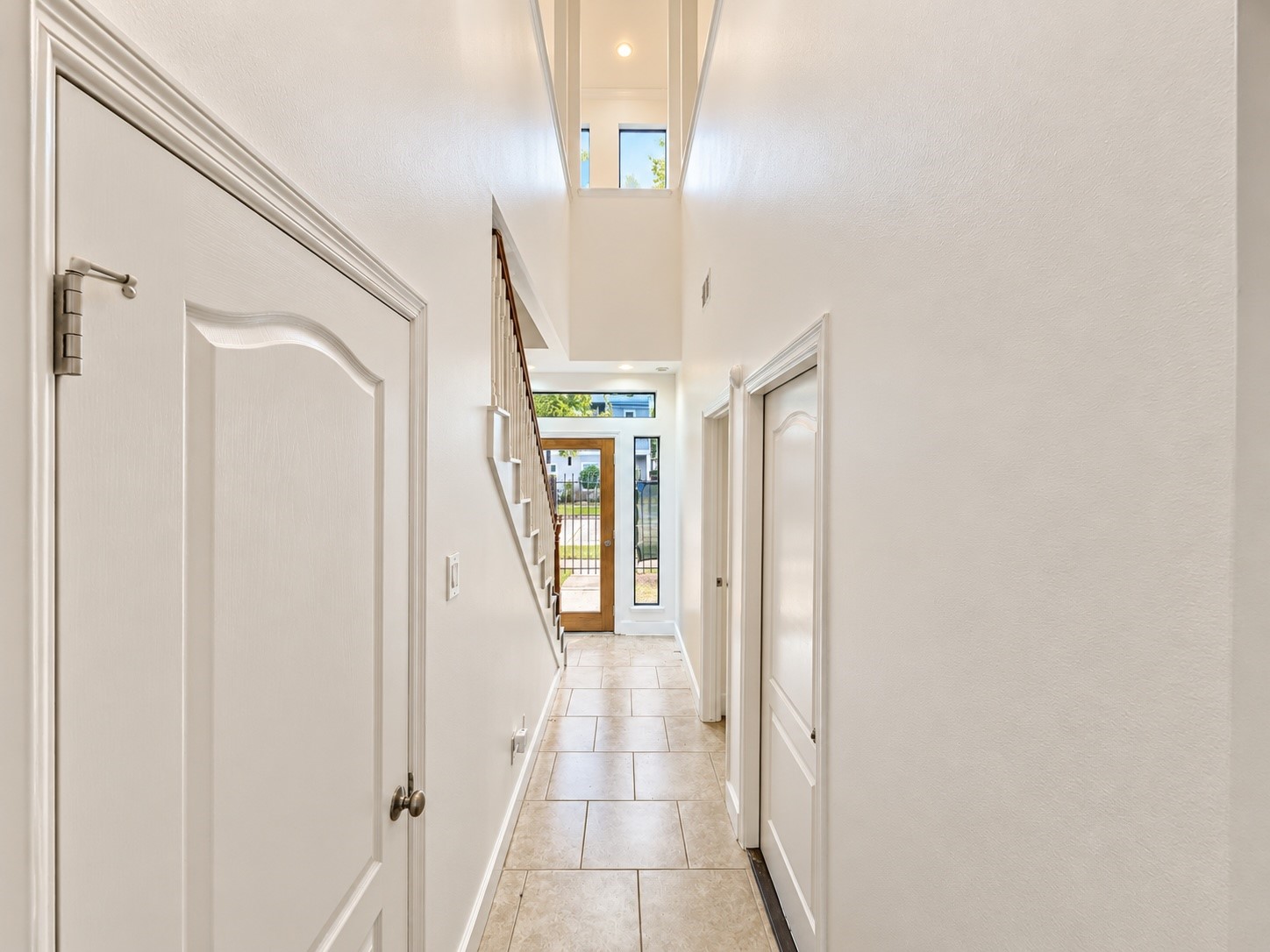 First floor hallway leading from the utility room/garage and first floor bedroom.