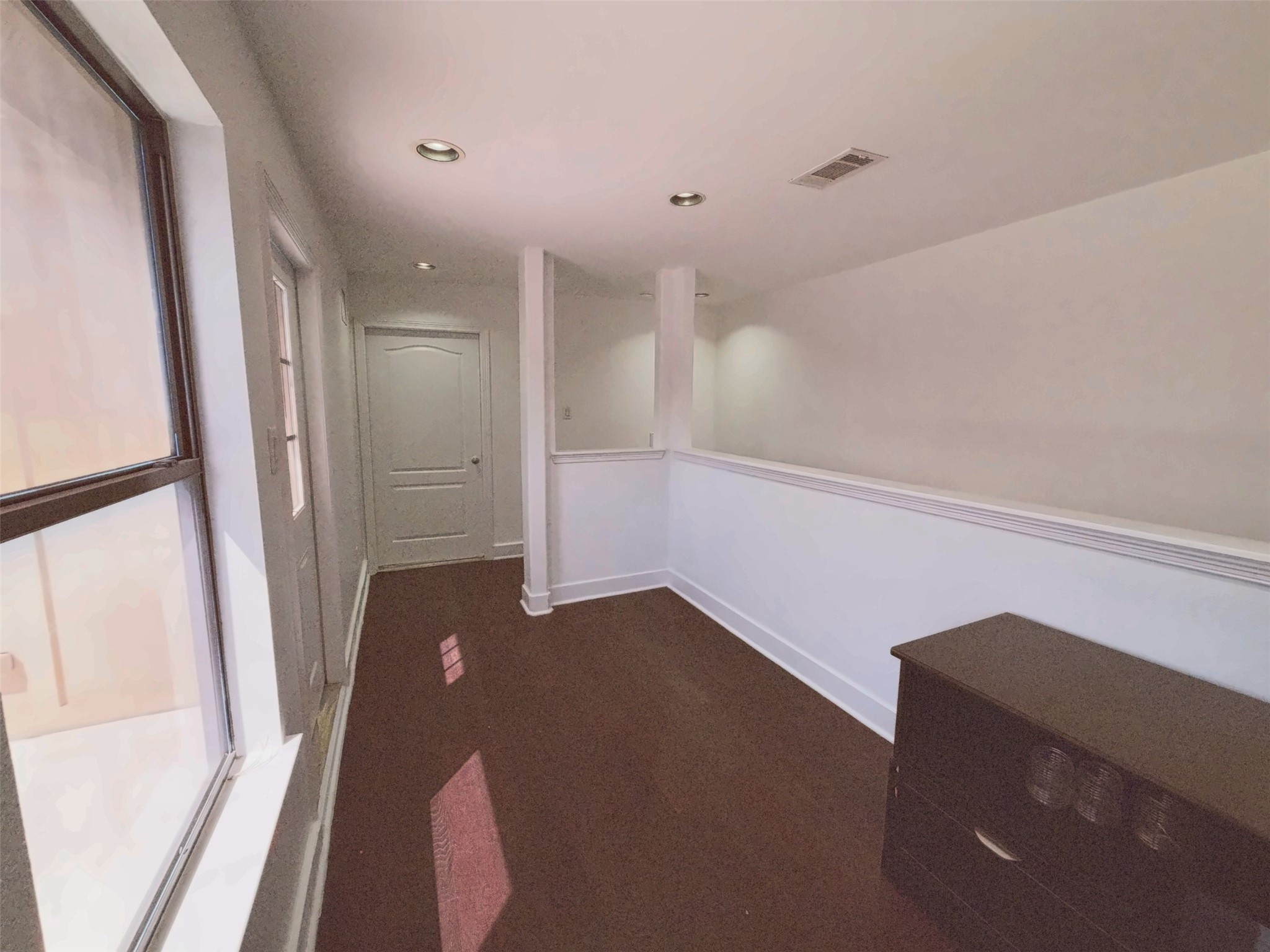 Natural light flowing in from the fourth level roof top terrace.
